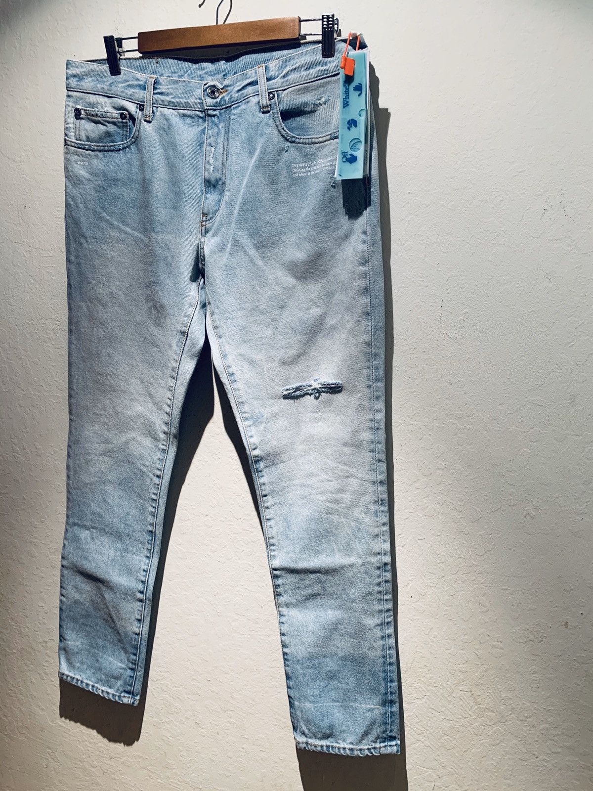 image of Off White Off-White 2013 Virgil Abloh Distressed Denim Jeans in Faded Light Blue Denim/White (Size 