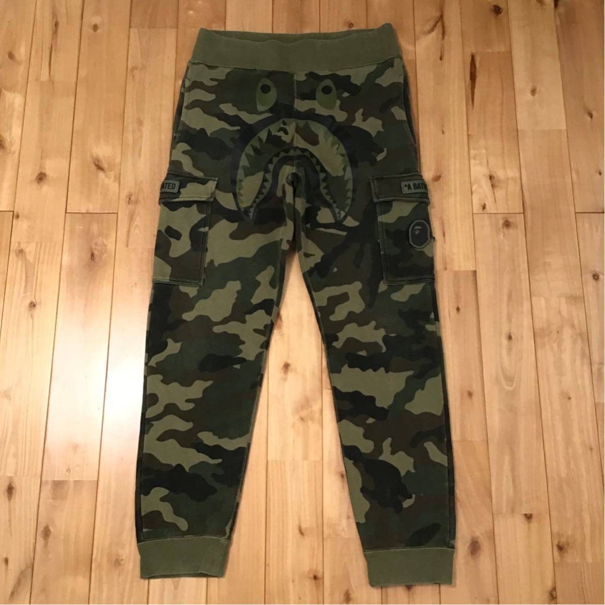 Bape × Undefeated BAPE × undefeated Shark sweat pants woodland camo ★size M Size US 32 / EU 48 - 1 Thumbnail