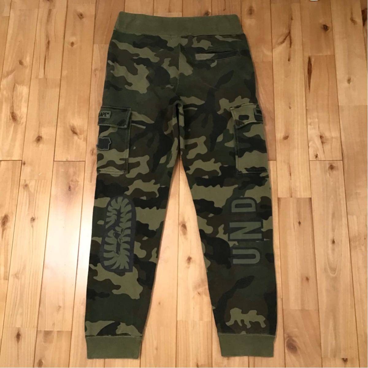 Bape × Undefeated BAPE × undefeated Shark sweat pants woodland camo ★size M Size US 32 / EU 48 - 2 Thumbnail