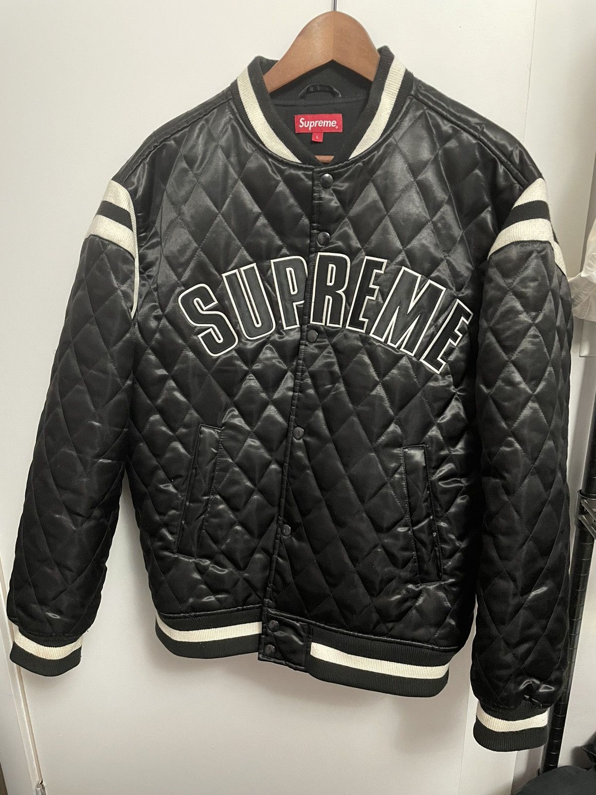 Supreme quilted satin varsity jacket store