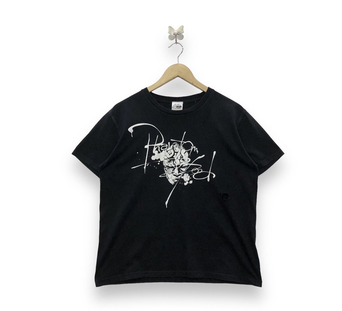 image of Anima x Cartoon Network Jojo Bizzare Adventure Ishi Kamen Graphic Tshirt in Black (Size Small)
