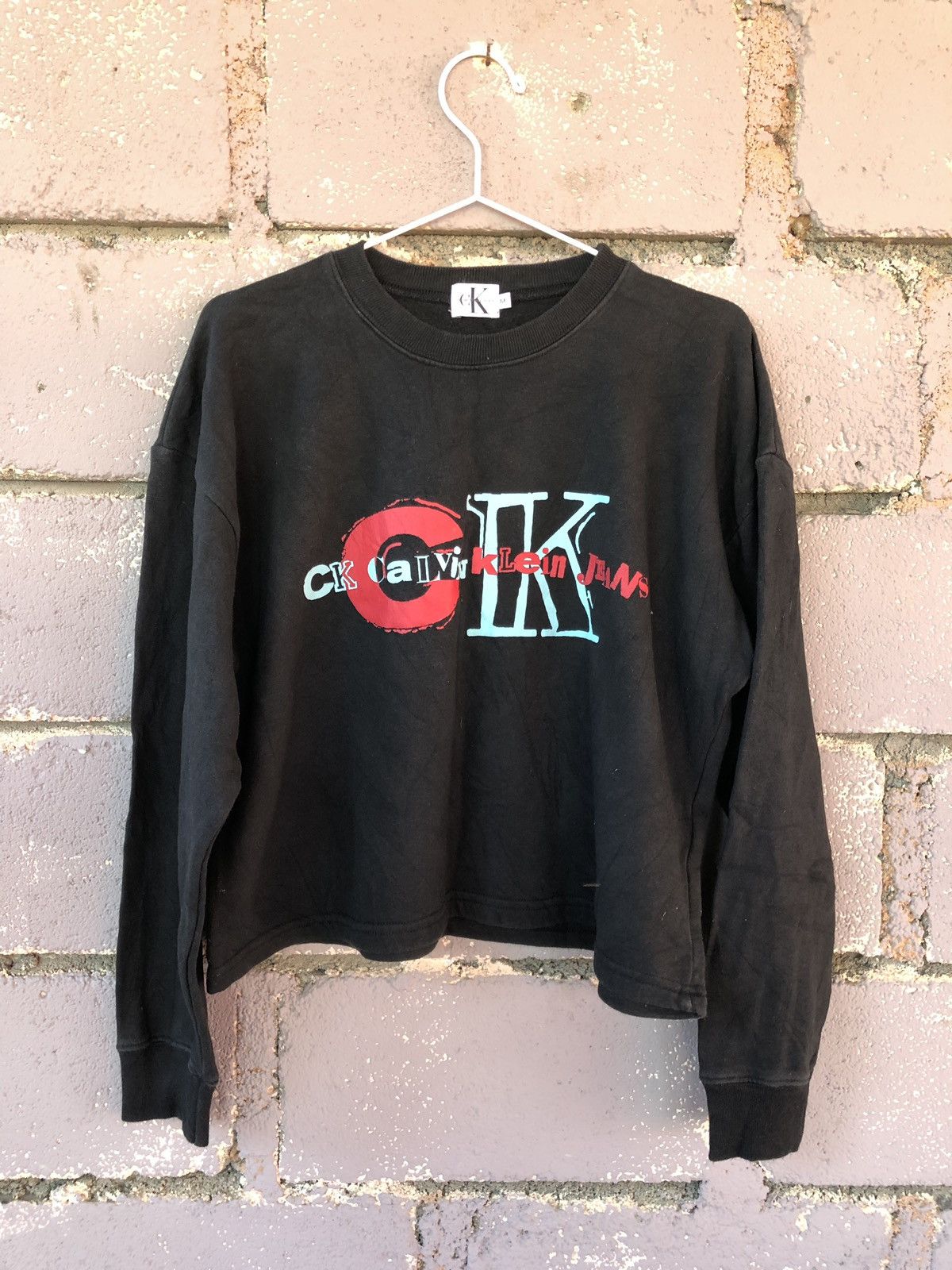 image of 90's Vintage Calvin Klein Jeans Ck Spell Out Sweatshirt in Black, Men's (Size Medium)