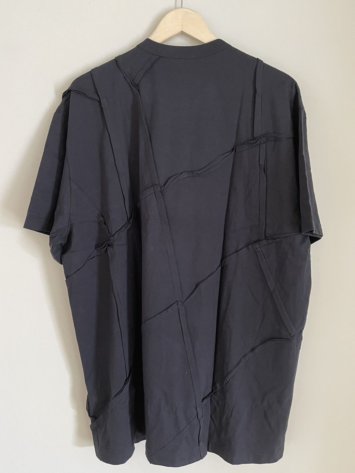 image of Comme Des Garcons x Comme Des Garcons Homme Plus Stitch Paneled T-Shirt in Black, Men's (Size Large
