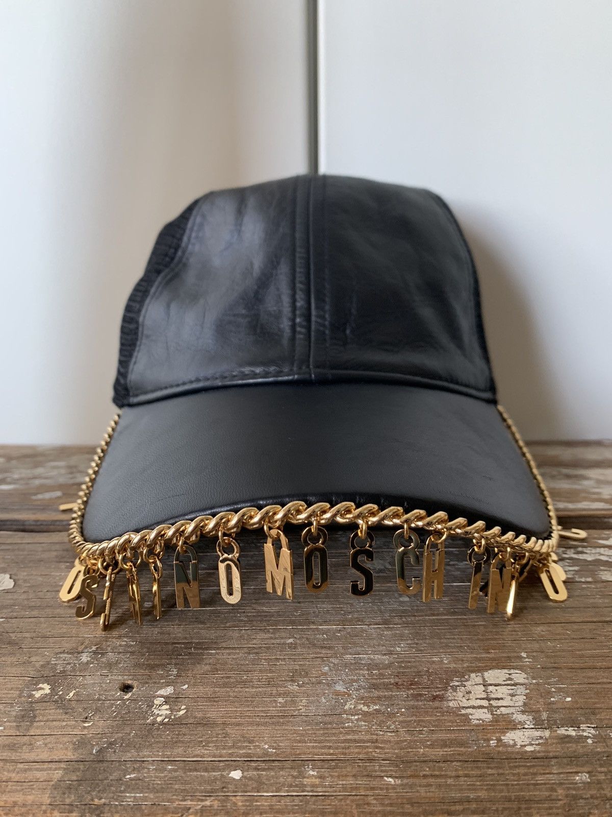 H M X MOSCHINO LEATHER CAP WITH GOLD CHAIN BRIM Accessories