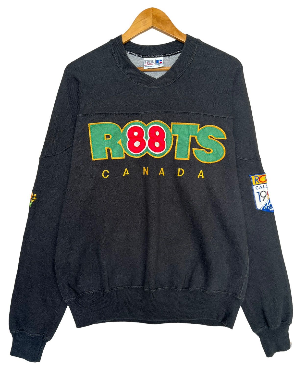 image of Vintage 80's Calgary Olympic Roots Canada Russell Sweatshirt in Black, Men's (Size Large)