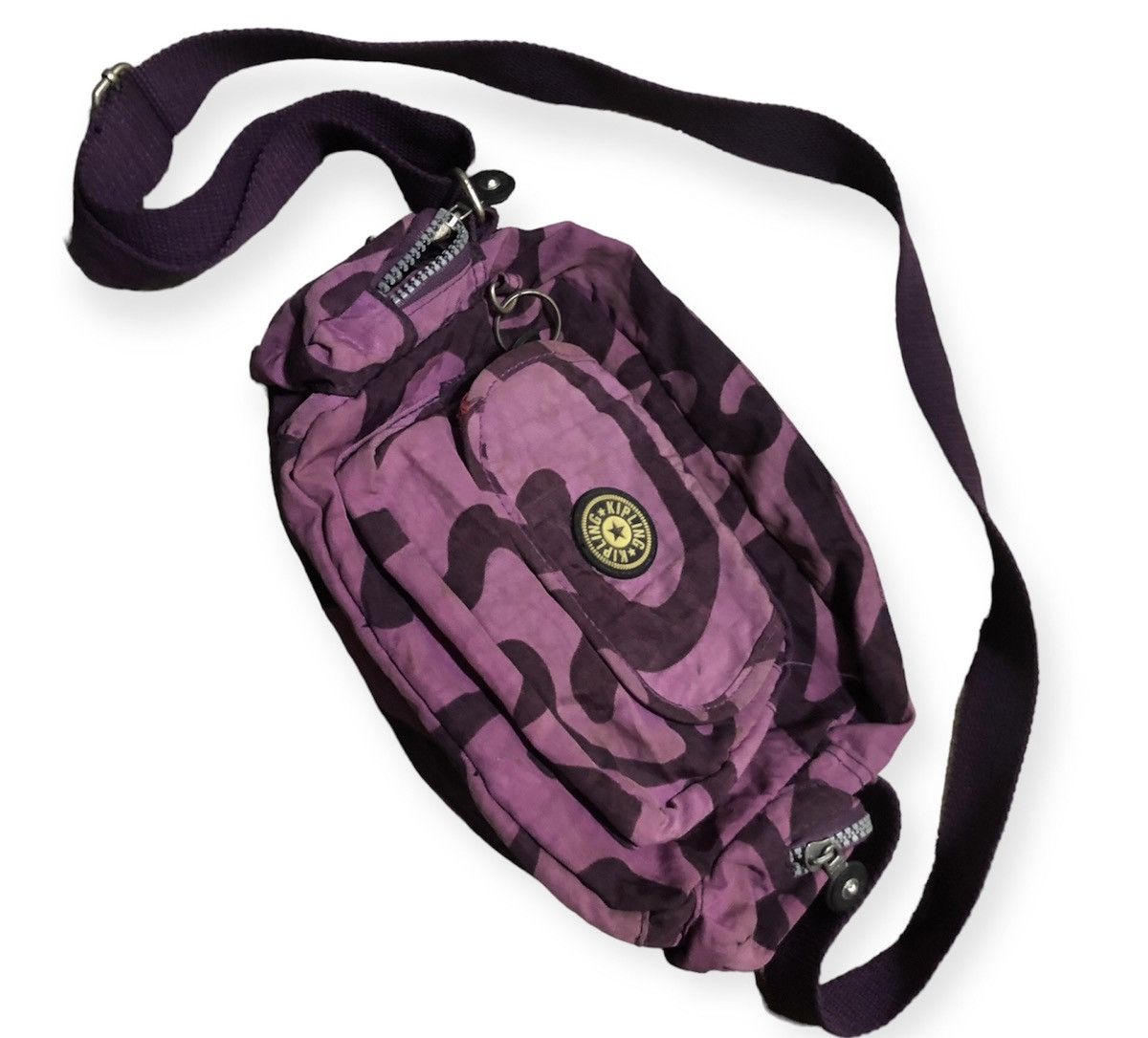 Vintage Kipling purple camouflage sling bag