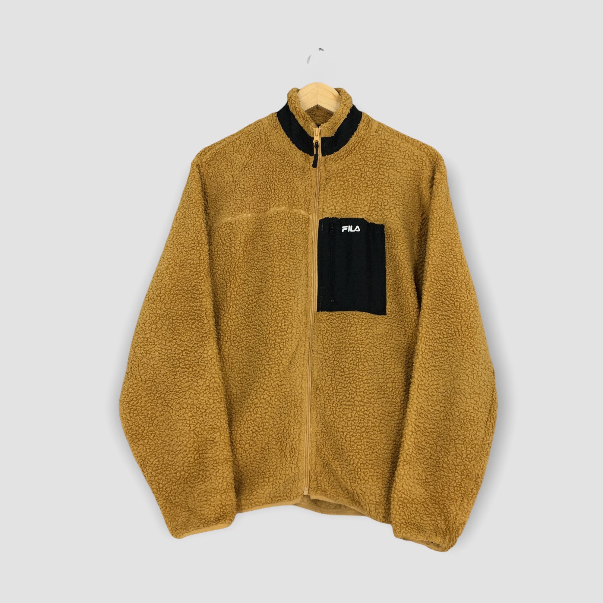 image of 90's Fila Bulky Fleece Sweater Medium in Brown, Men's
