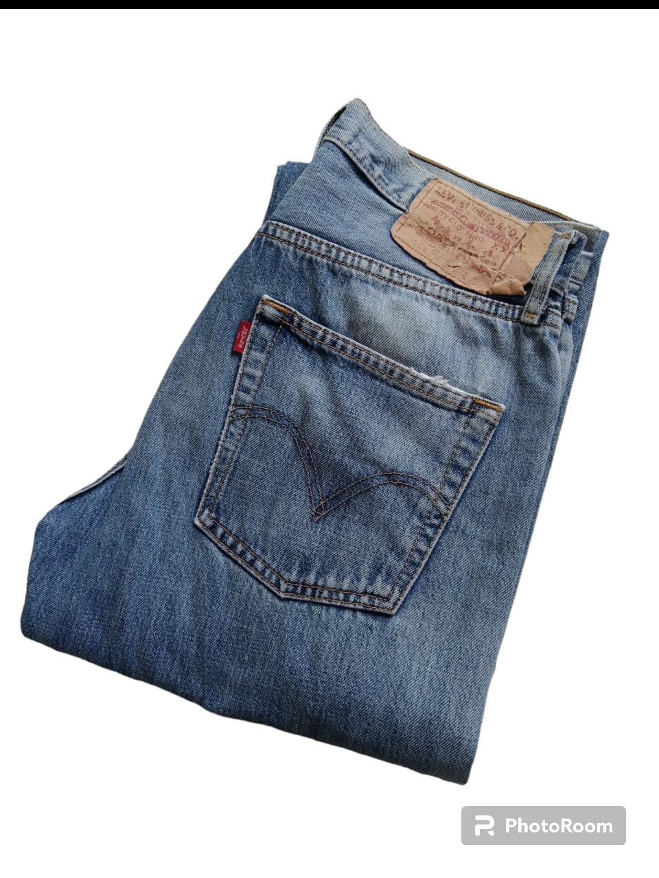 Vintage 90s Levi’s 501 distressed denim