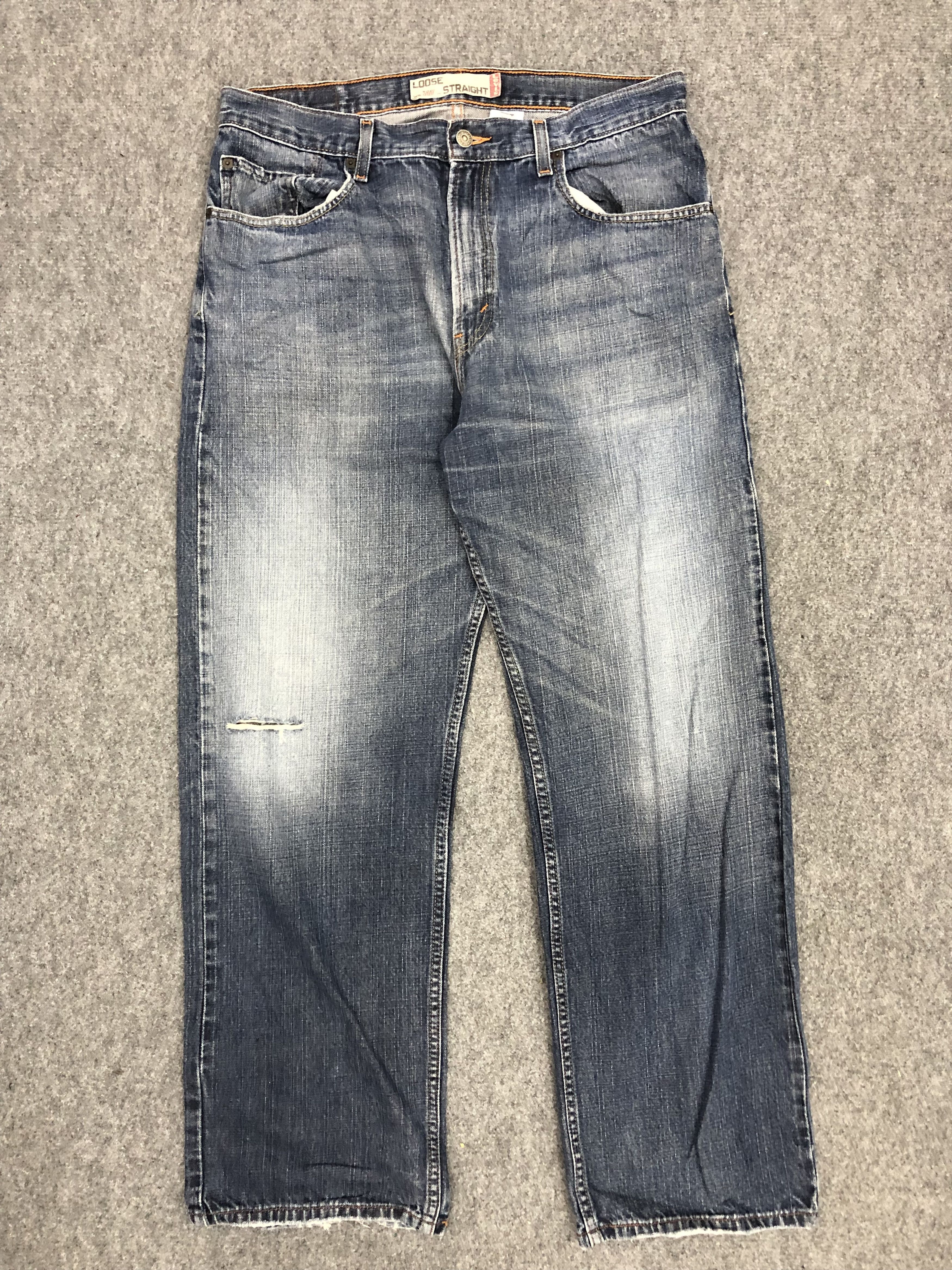 image of Levis 569 Faded Blue Baggy Jeans in Blue Denim, Men's (Size 36)