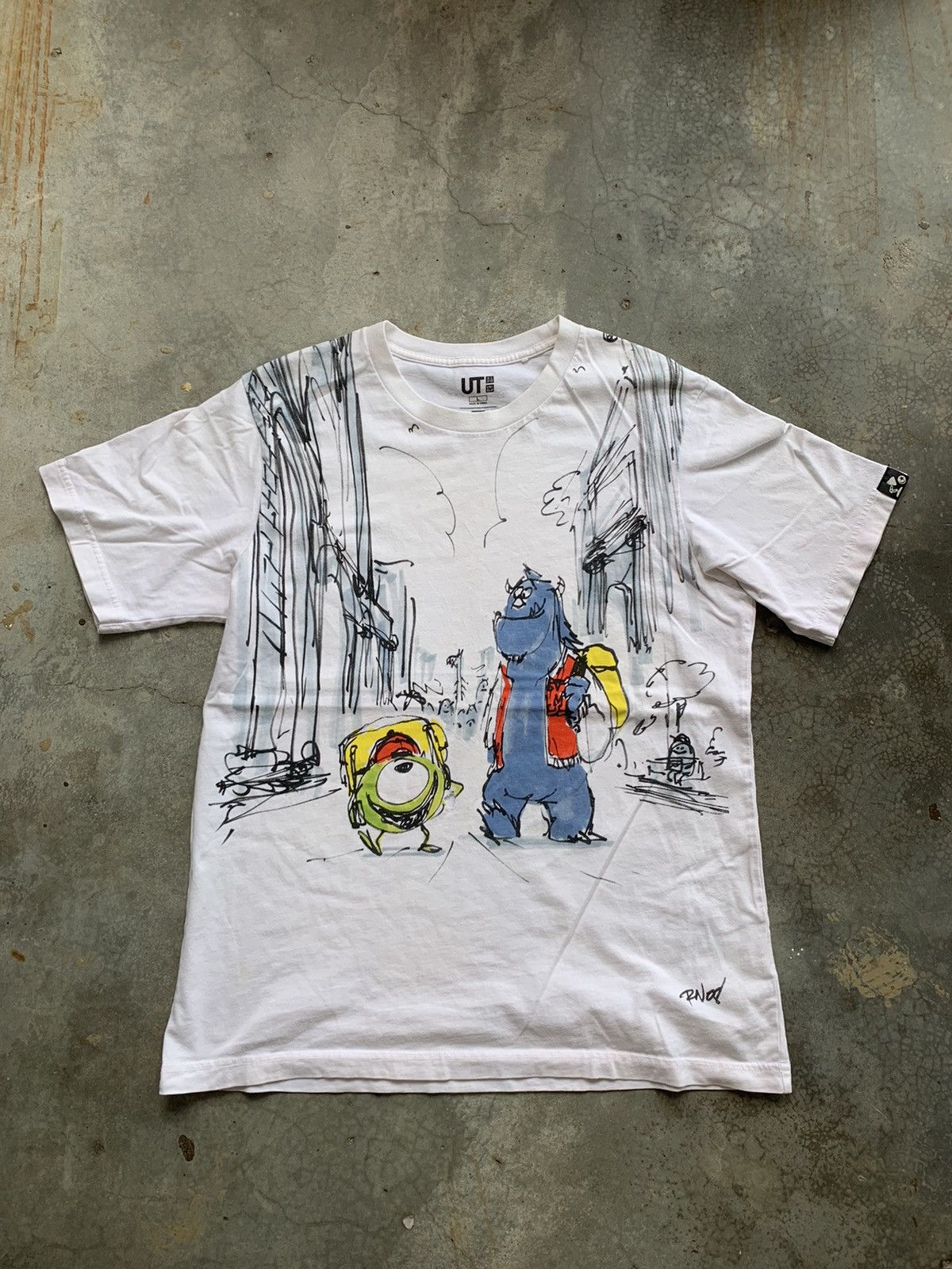 image of Uniqlo Disney Pixar Monsters University Art Tshirt in White, Men's (Size Large)