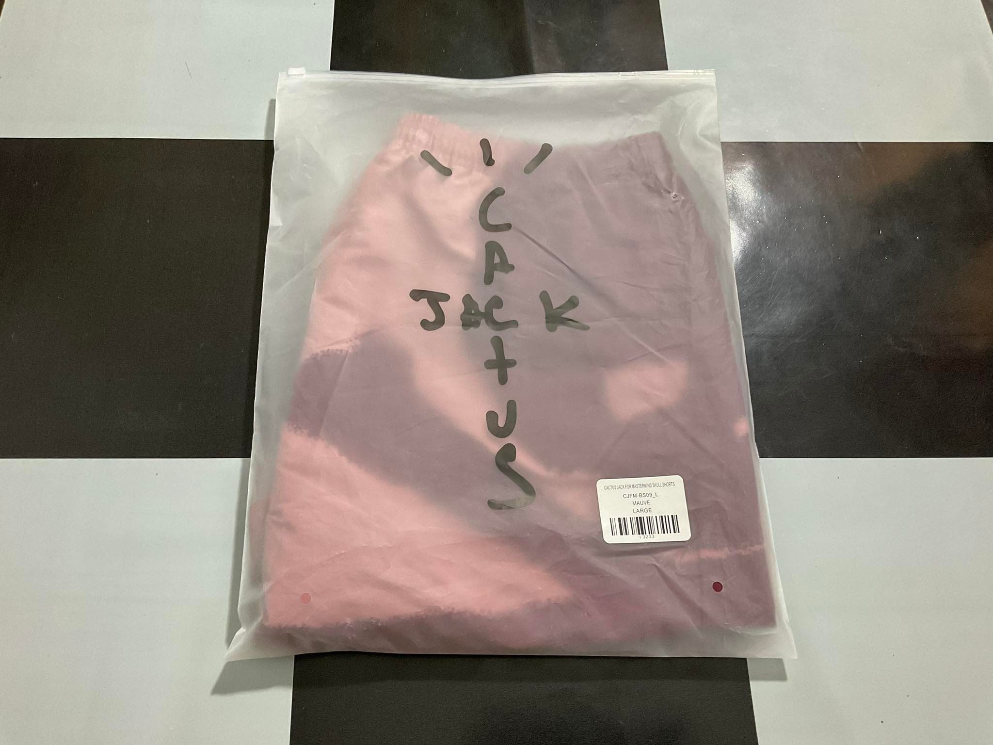 image of Mastermind Japan x Travis Scott Cactus Jack X Mastermind Skull Shorts in Mauve Pink, Men's (Size 34