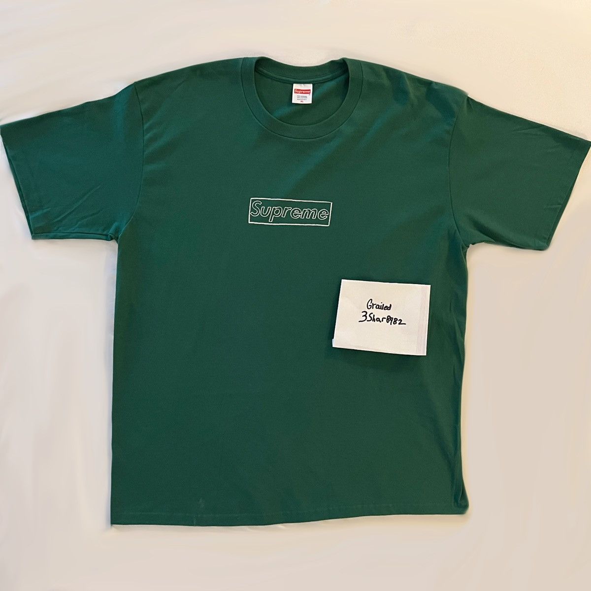 Supreme Supreme x Kaws Chalk Logo Tee “Light Pine” | Grailed