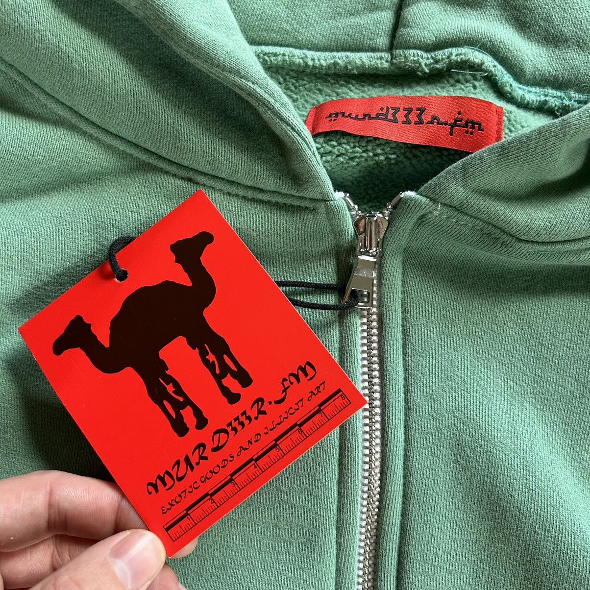 Aris Tatalovich × murd333r.fm PEACEMAKER BOXY CROPPED HEAVYWEiGHT ZiP UP HOODiE GREEN Size US L / EU 52-54 / 3 - 4 Thumbnail