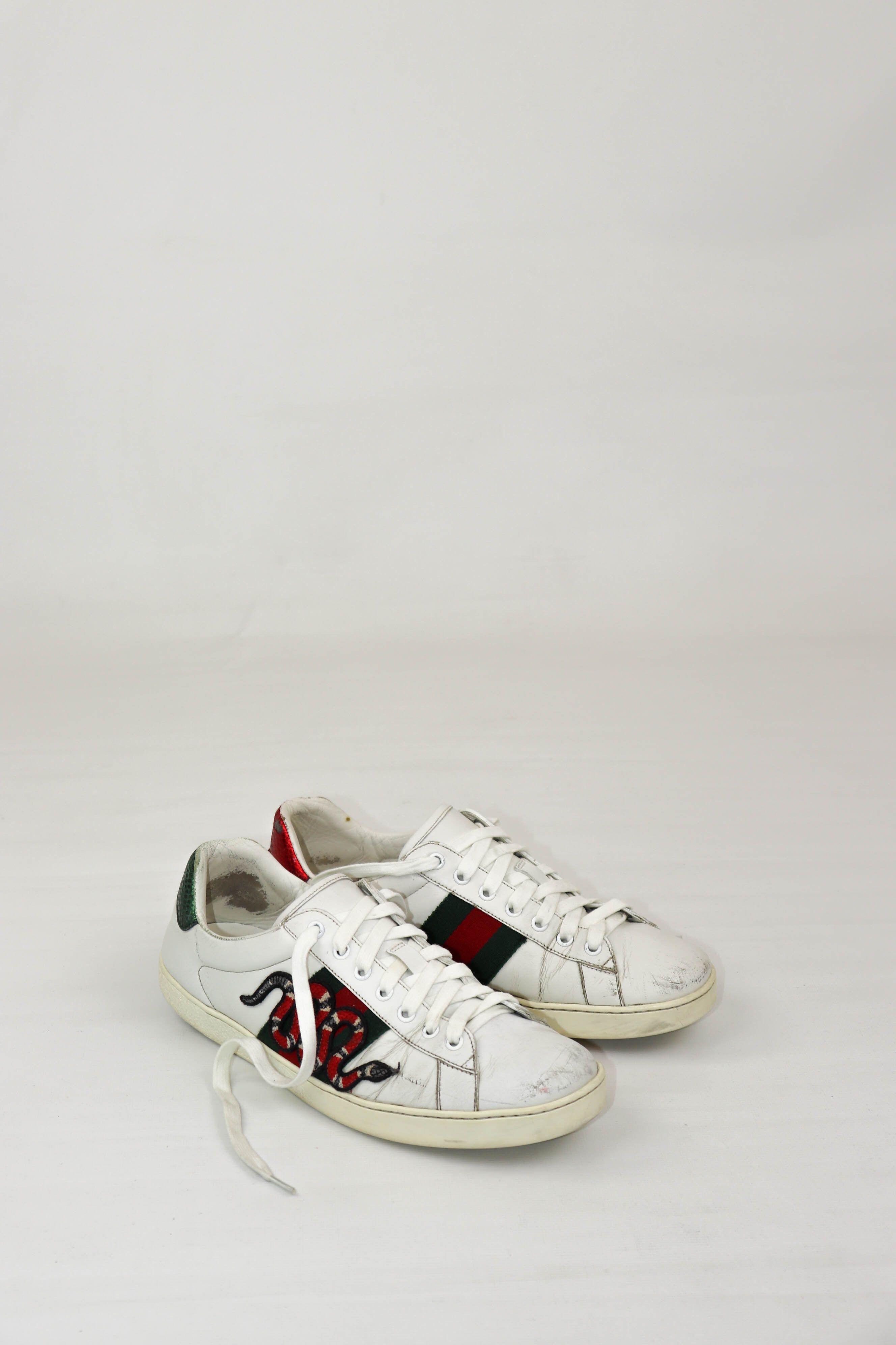 image of Gucci New Ace Embroidered Snake Distressed Leather Sneakers in White, Men's (Size 9)