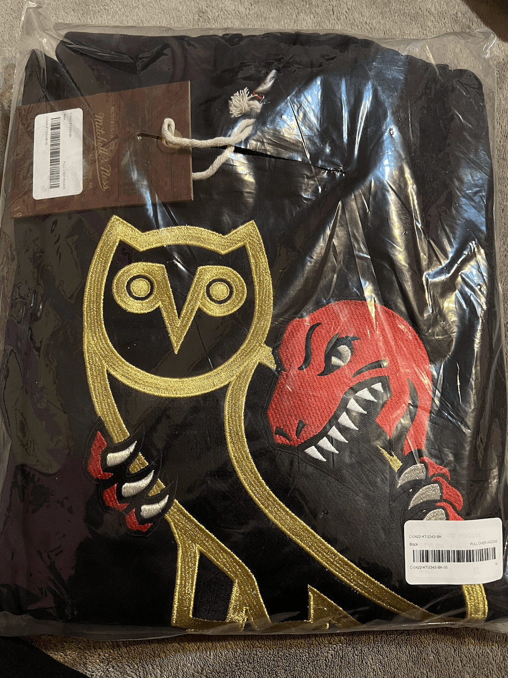 image of Mitchell Ness x NBA Ovo X Mitchell And Ness 95’ OG Owl Raptors Hoodie in Black, Men's (Size XL)