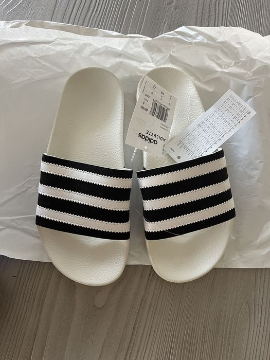 Adidas Adidas adilette black and white slides Grailed