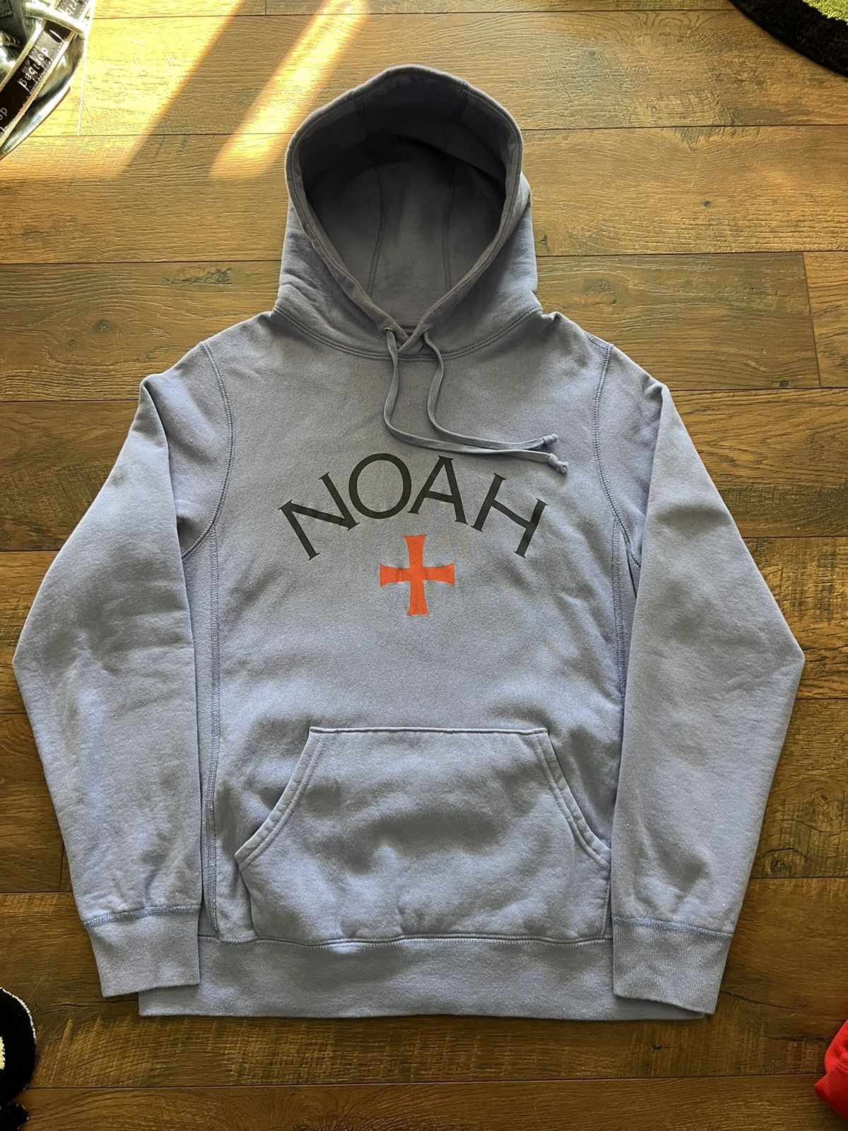 image of Noah Core Logo Cross Pullover Hoodie in Periwinkle Blue, Men's (Size Medium)