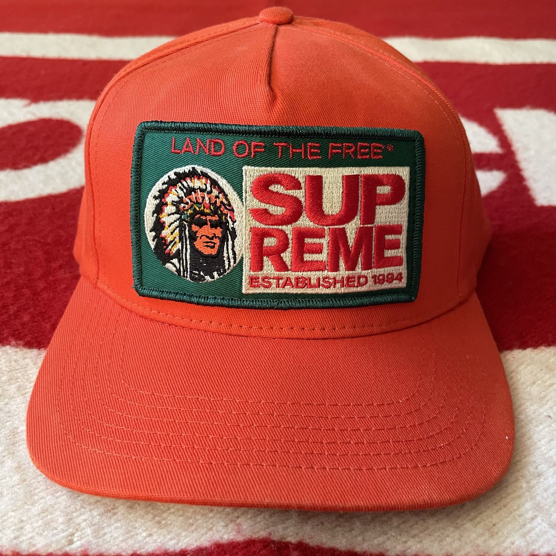 Supreme red cheap man hat