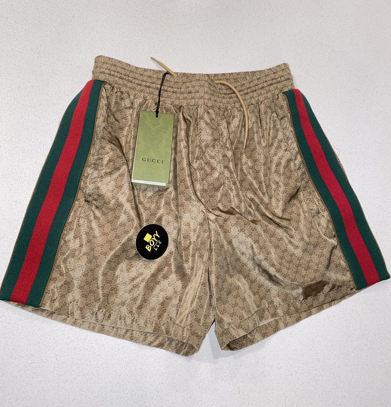 image of Gucci Web GG Logo Swim Shorts in Tan, Men's (Size 34)