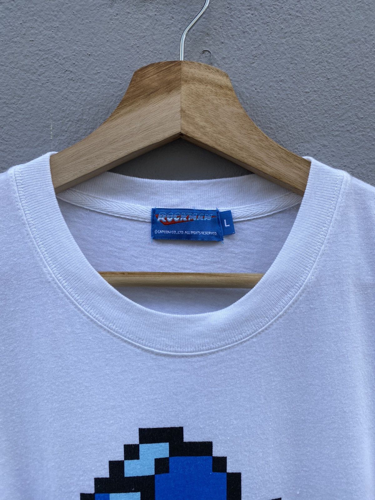 Japanese Brand 💥Vintage 80s-90s CAPCOM “ROCKMAN” Games Rare Graphic Tees Size US L / EU 52-54 / 3 - 4 Thumbnail