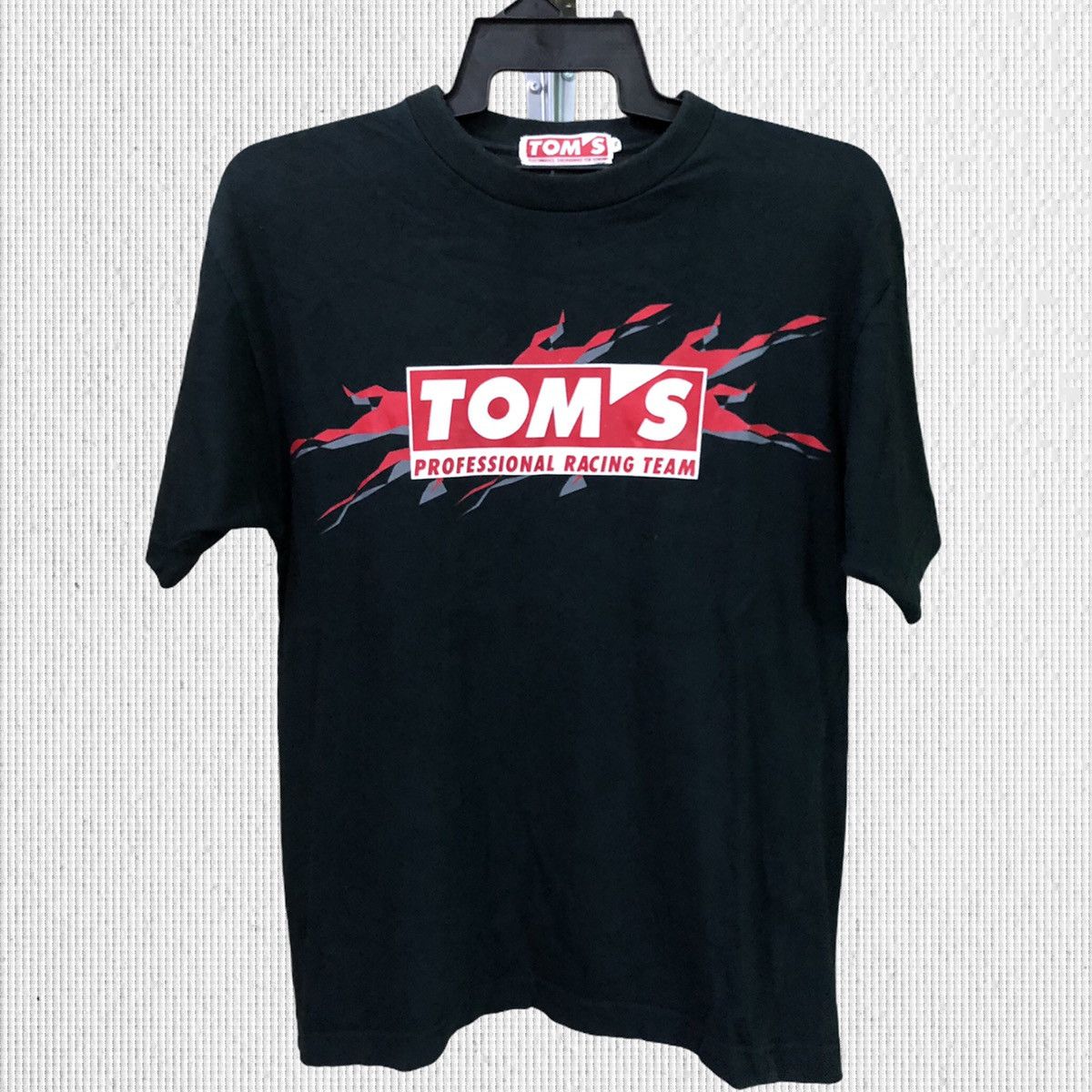 image of Tom’S Racing Team T-Shirt in Black, Men's (Size Medium)