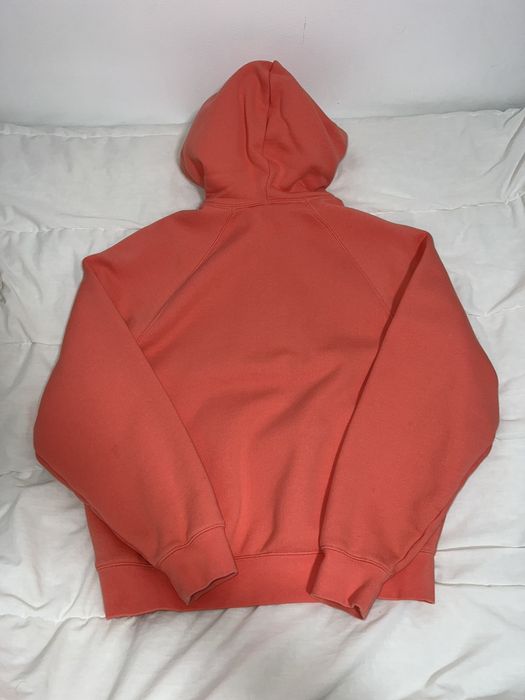 fear of god essentials full zip hoodie coral