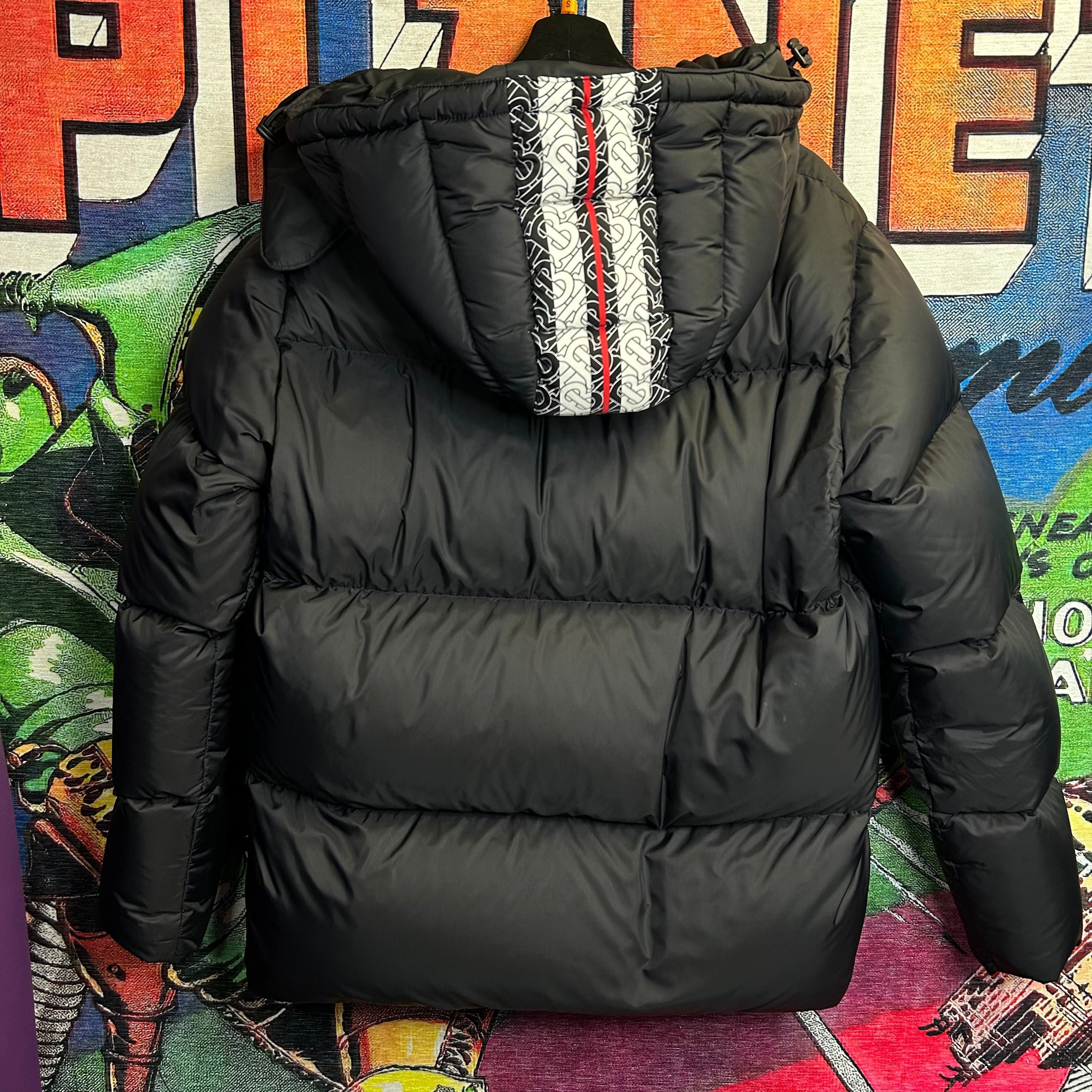 Hooded black down jacket with rubber monogram