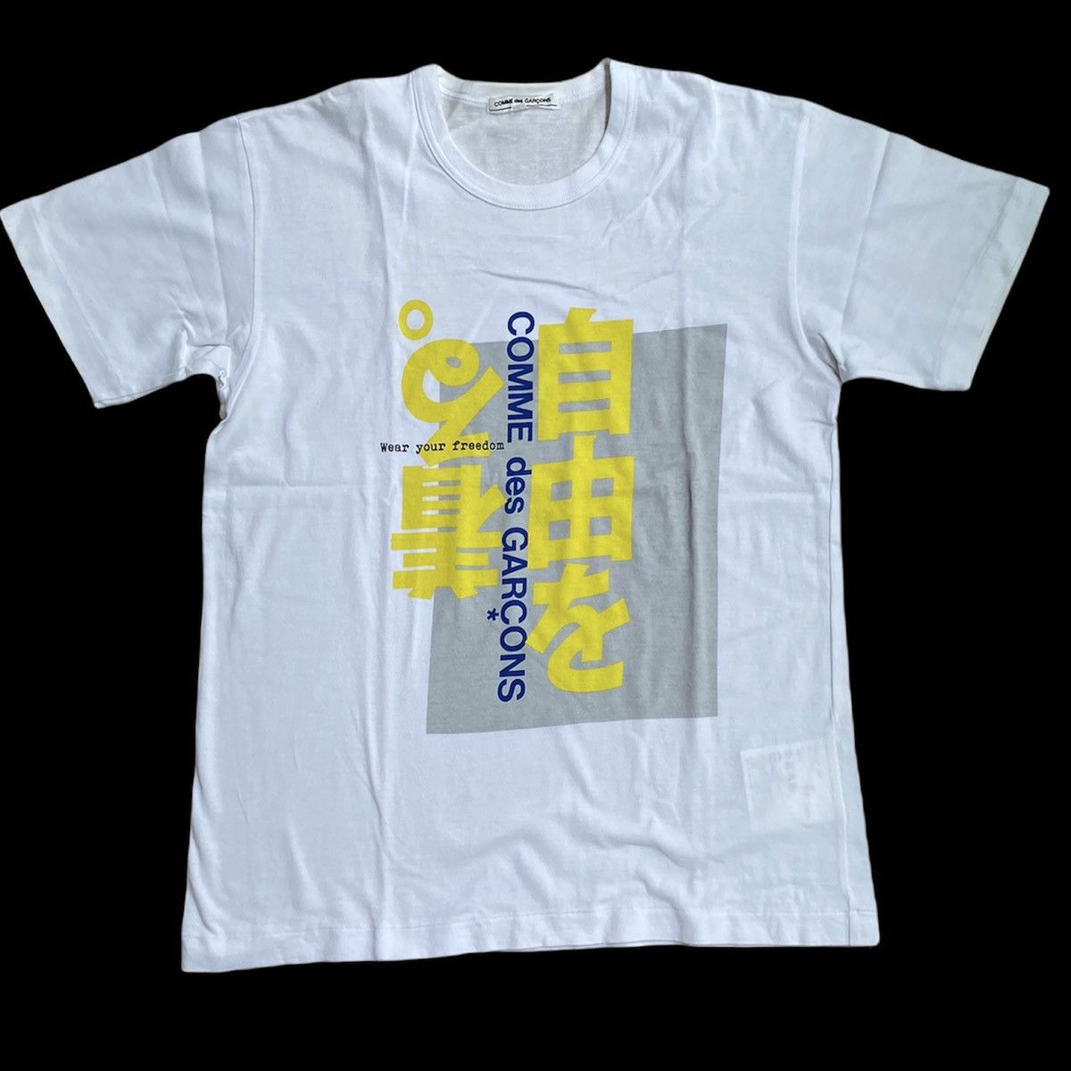 Comme des Garcons Comme Des Garcons “Wear Your Freedom” White T