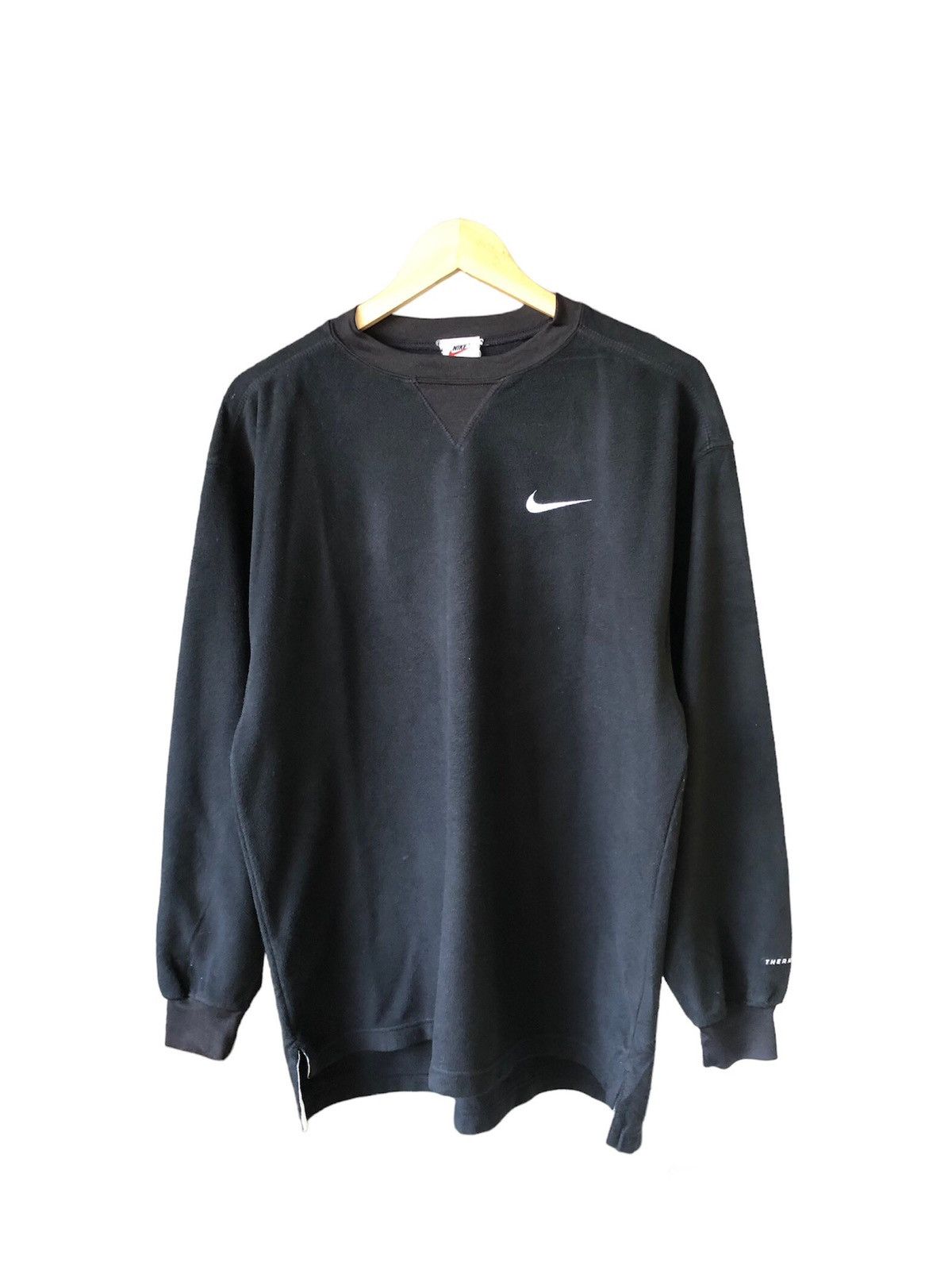 image of Nike 90's Therma Fit Oversized Fleece Long Sleeve in Black, Men's (Size Small)