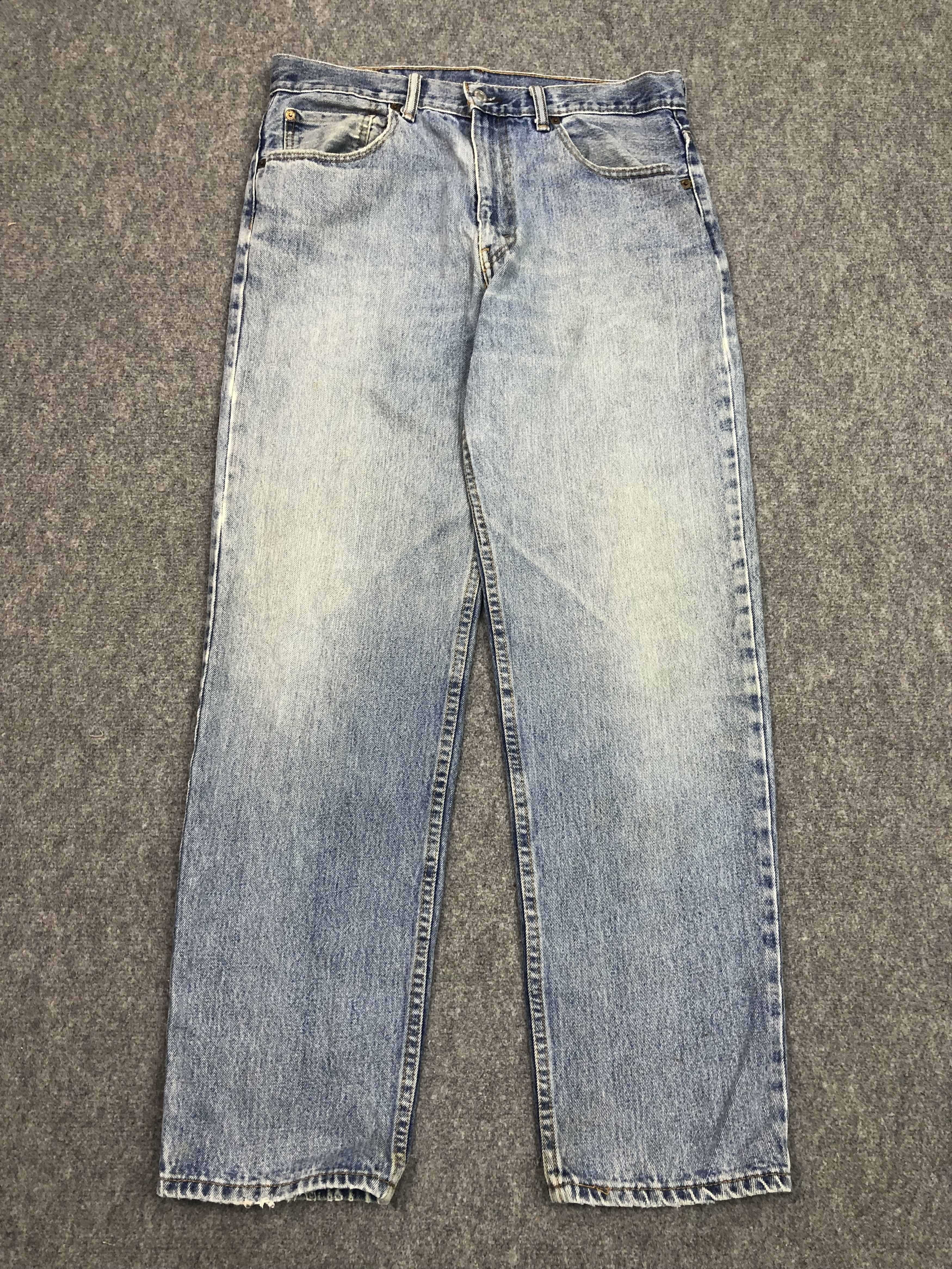Vintage Levis 550 Faded Blue Jeans 34x32 DP0384