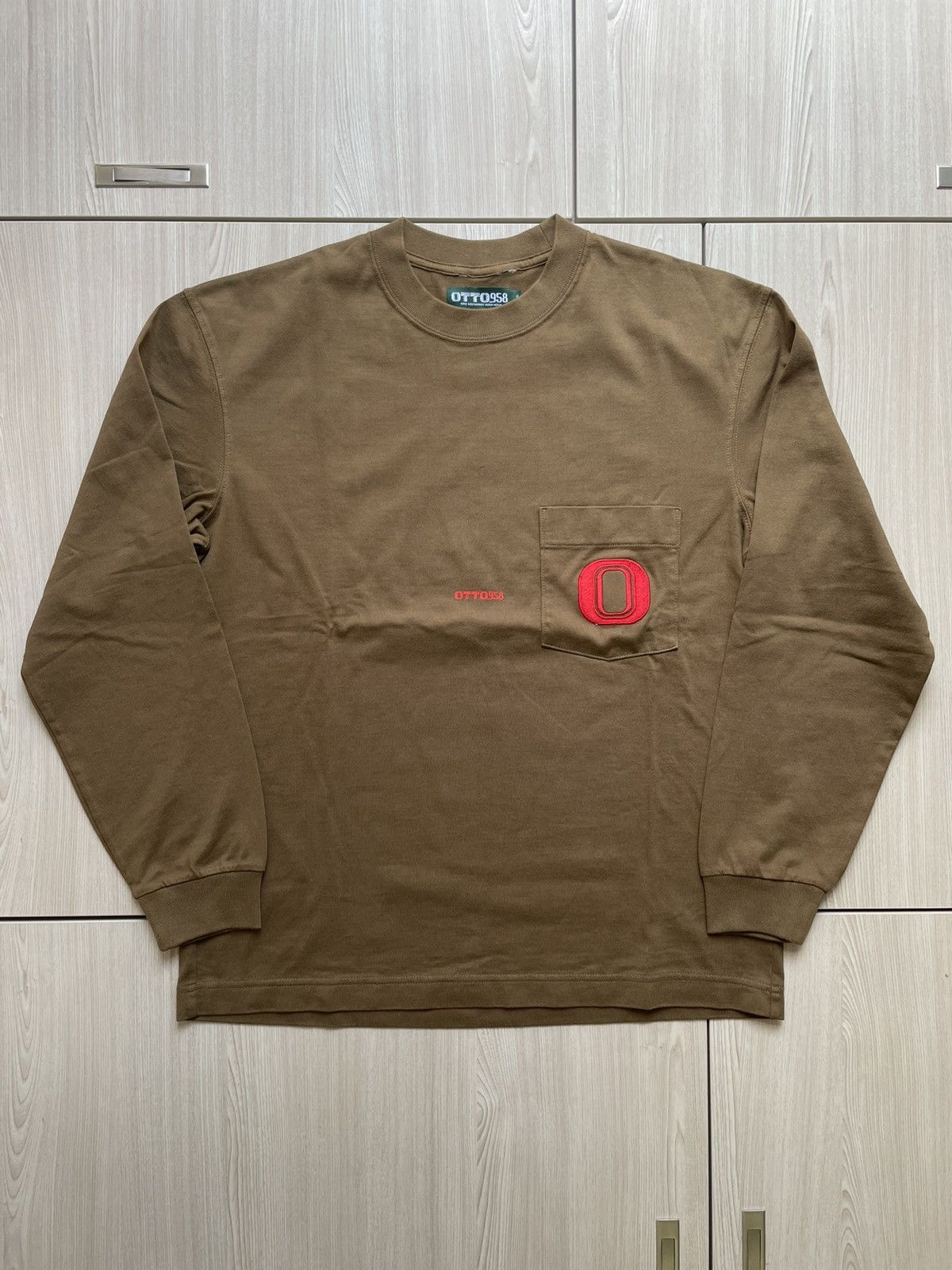 image of Kiko Kostadinov Otto 958 Squealer Long sleeve Tee in Brown, Men's (Size Small)