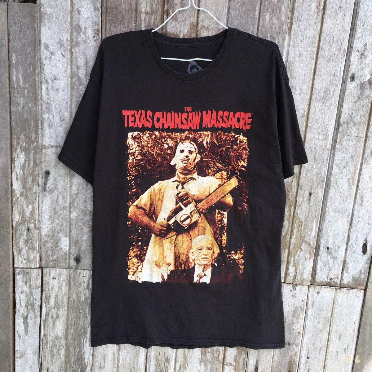 image of Faded The Texas Chainsaw Massacre Horror Movie Tee in Black, Men's (Size Large)