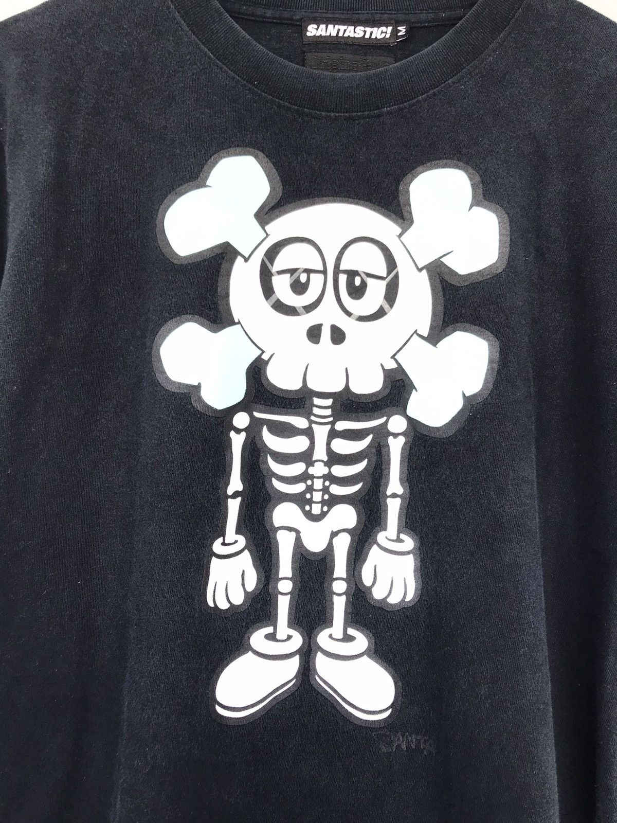Kaws × Original Fake Original Fake x Santastic Kaws Hasheem Glow in the dark tee Size US M / EU 48-50 / 2 - 9 Thumbnail