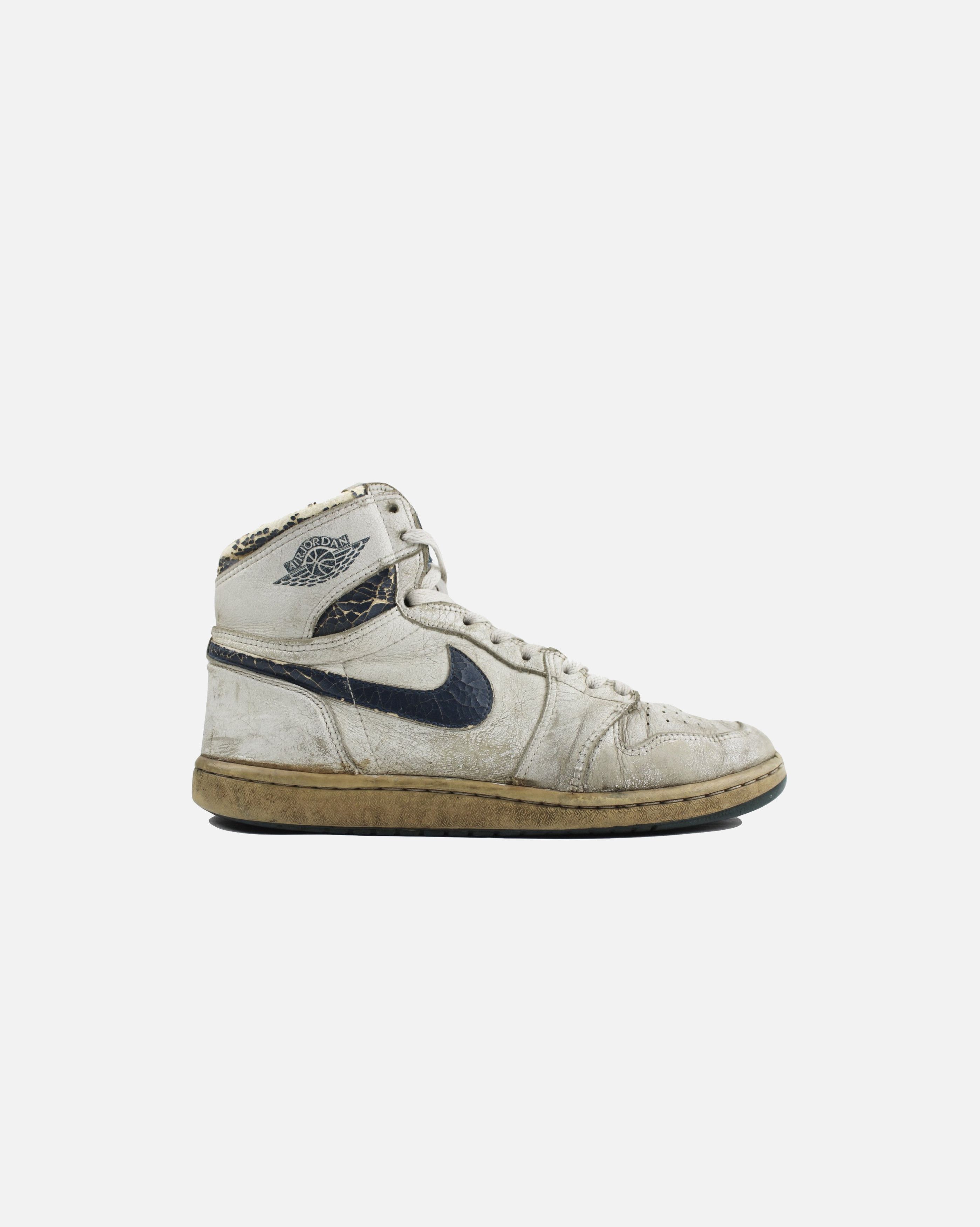 image of Nike Air Jordan 1 1985 Metallic Blue Shoes in Blue Metallic, Men's (Size 10)