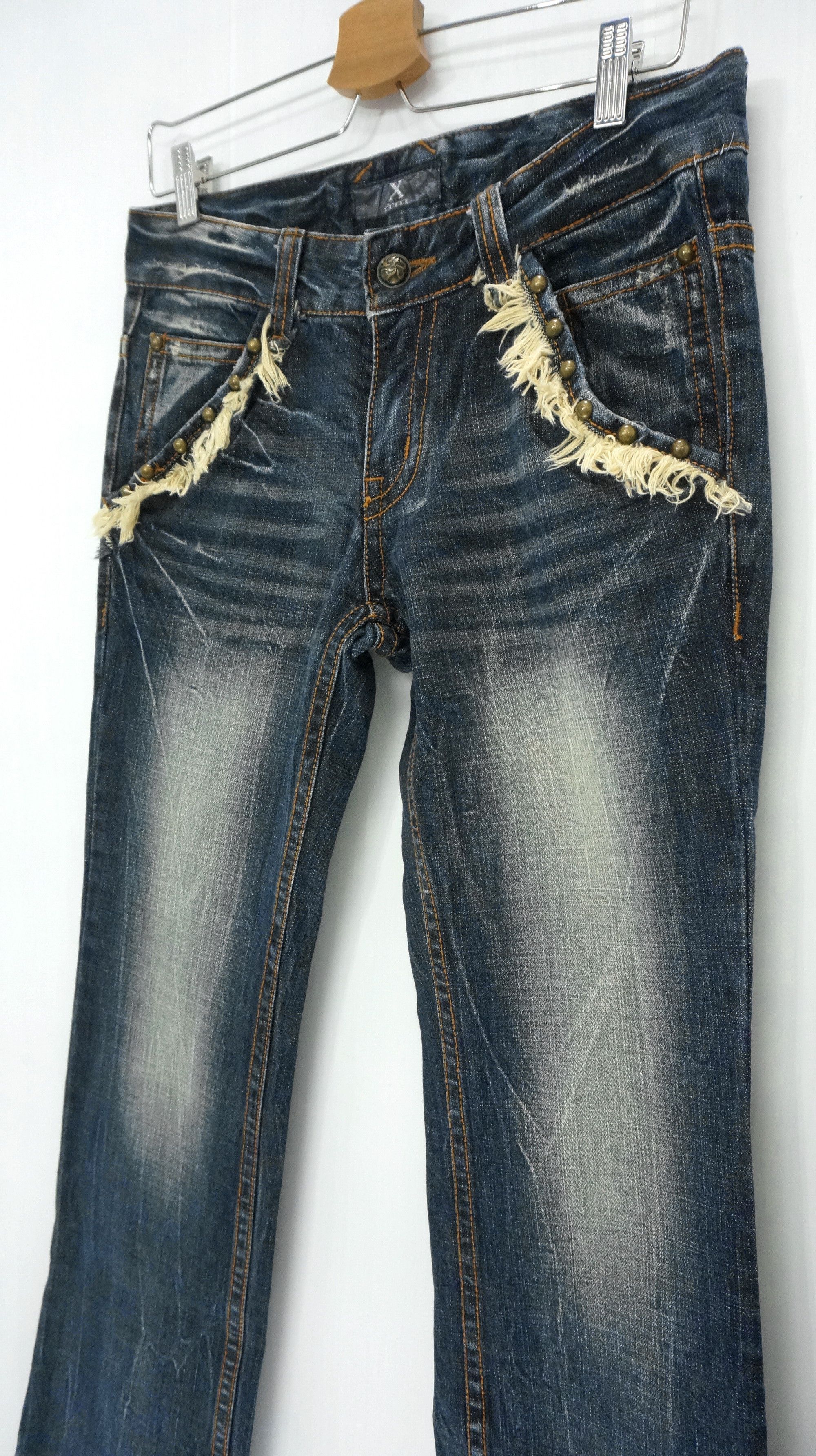 image of Distressed Denim x Vintage Xfrm Flare Vintage Distressed Studded Jeans in Old Dark Blue (Size 30)