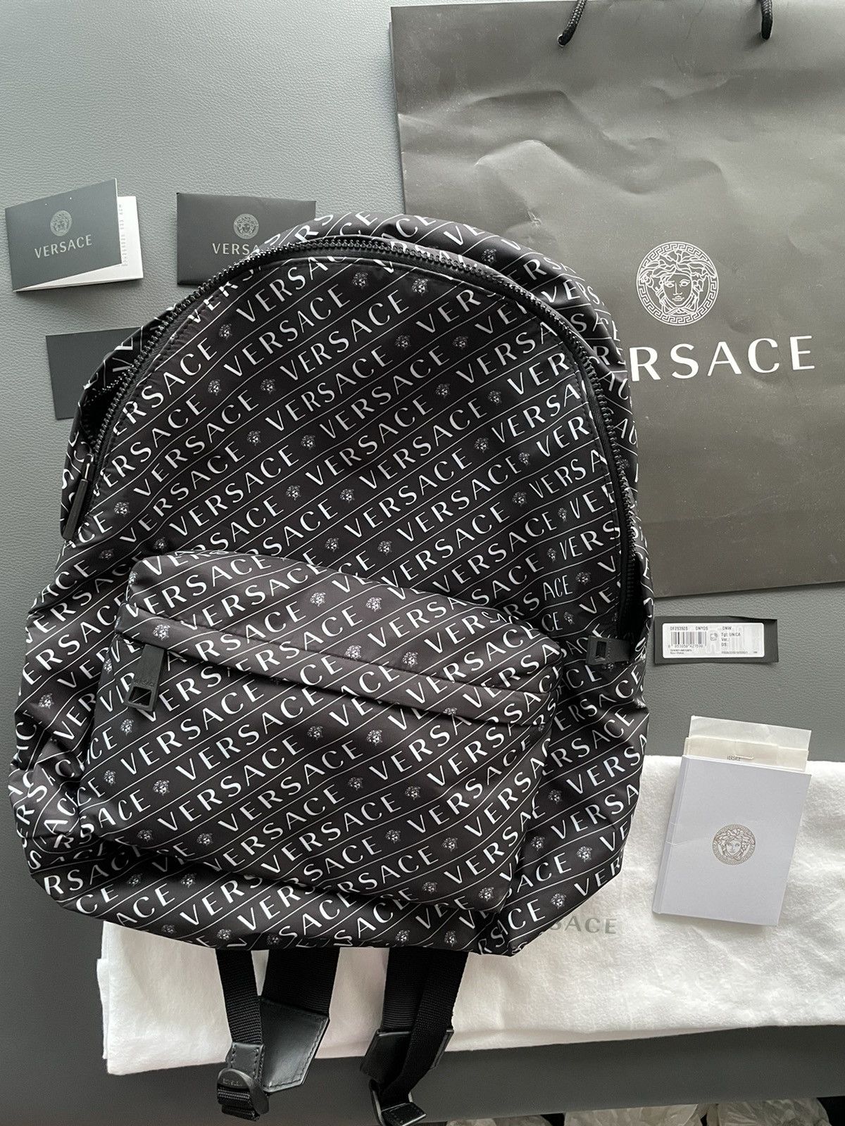 image of Versace Super Runway Iconic Monogram Logo Backpack in Black, Men's