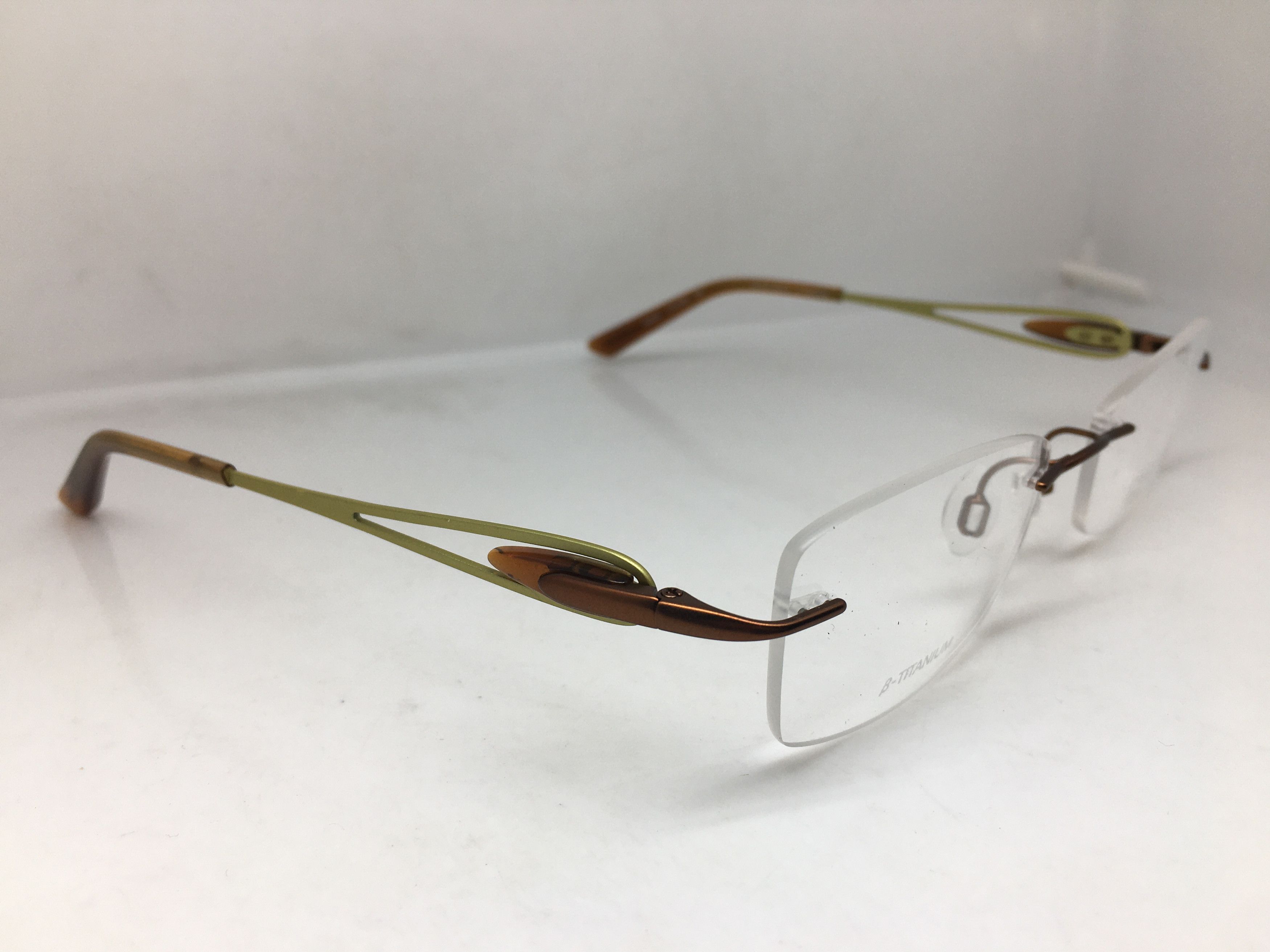 CHARMANT CH10961 BR Rimless Titanium RX Eyeglasses Frames