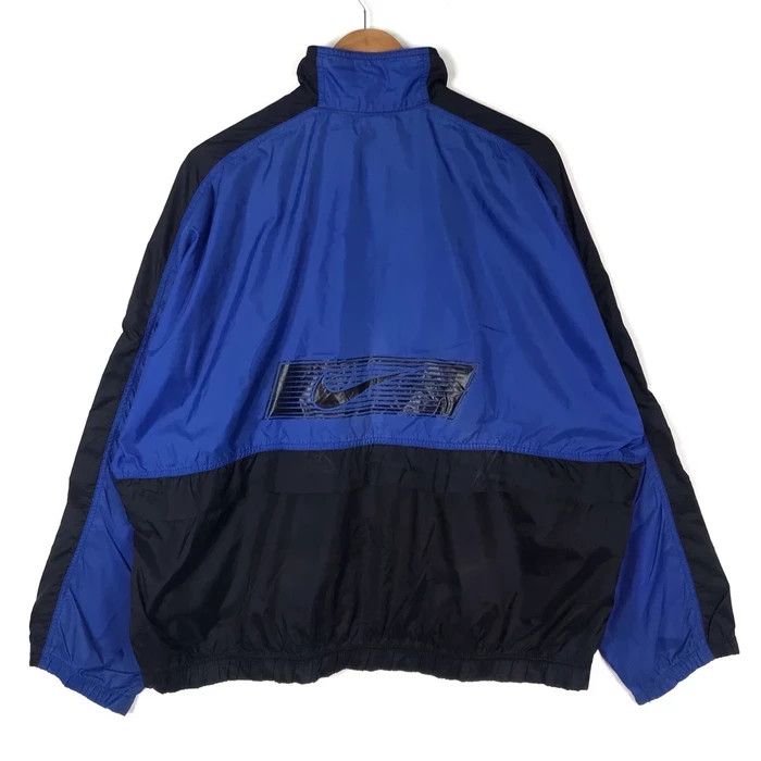 Vintage Vintage NIKE SWOOSH Blue Bomber Jacket Windbreaker Hip Hop Size US XL / EU 56 / 4 - 1 Thumbnail