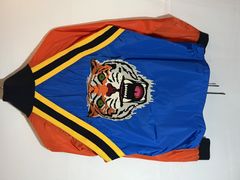 Gucci Tiger Face Embroidered Bomber Jacket, $2,338, farfetch.com
