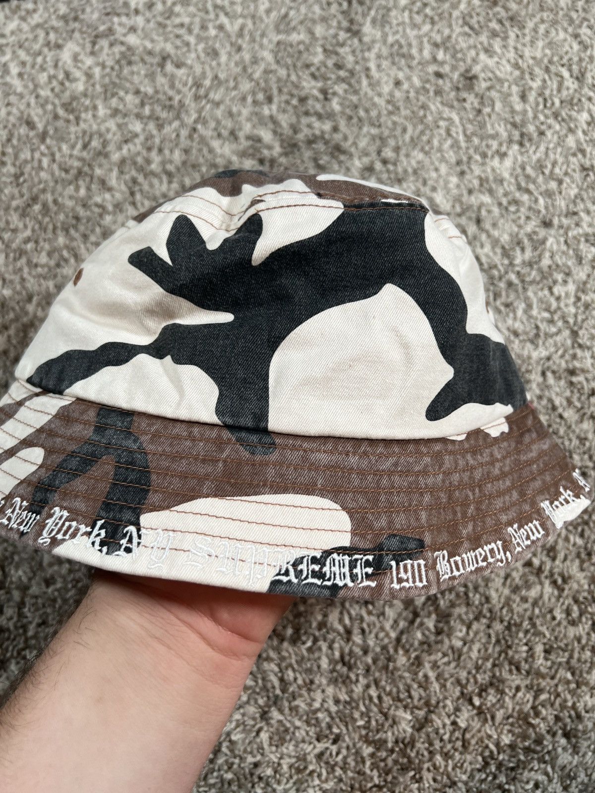 Supreme Brim text Bucket hat camo