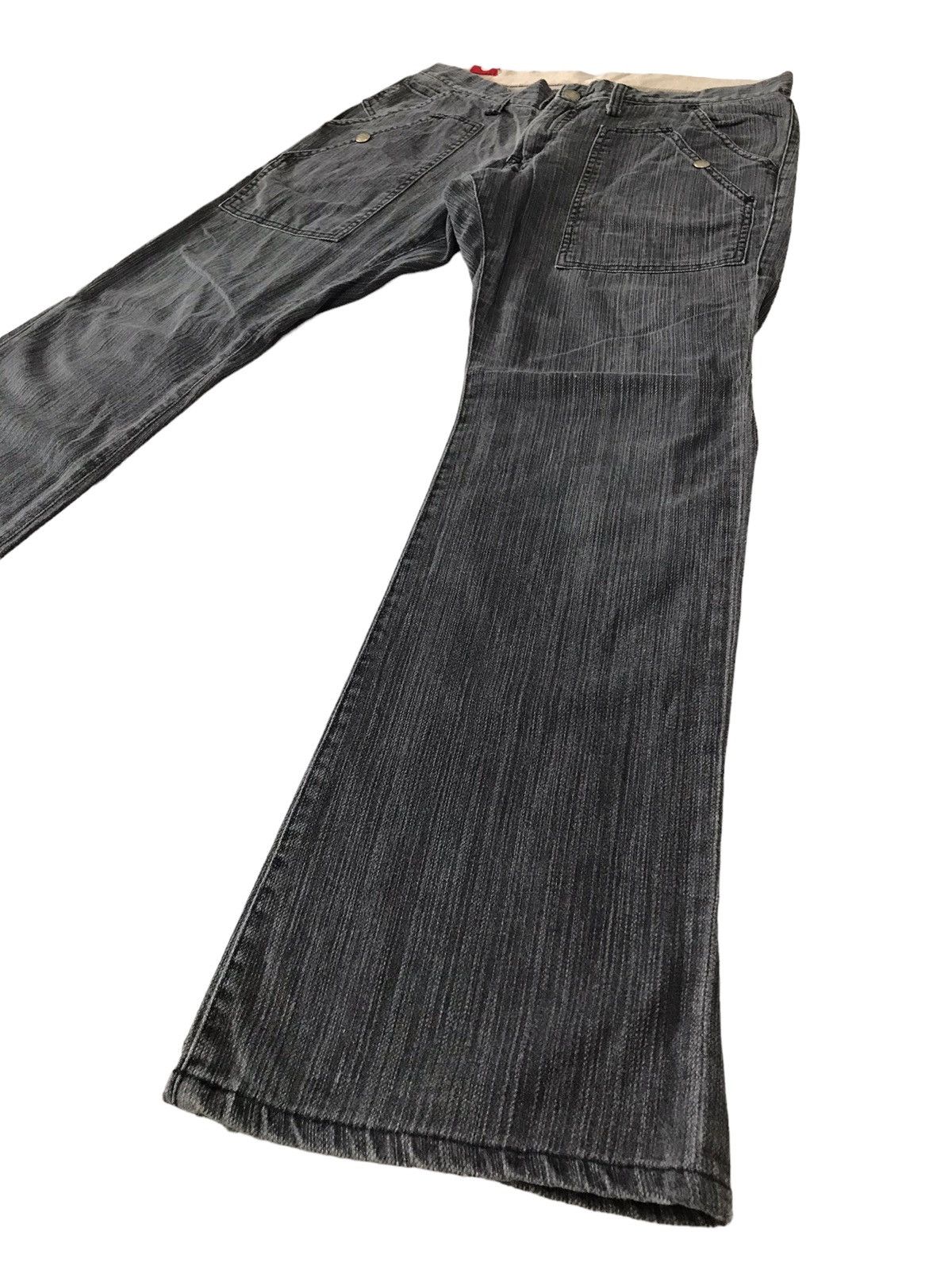 image of Distressed Denim Multi Pocket Blue Way Stripes Jeans Boot Cut Denim in Black, Men's (Size 32)