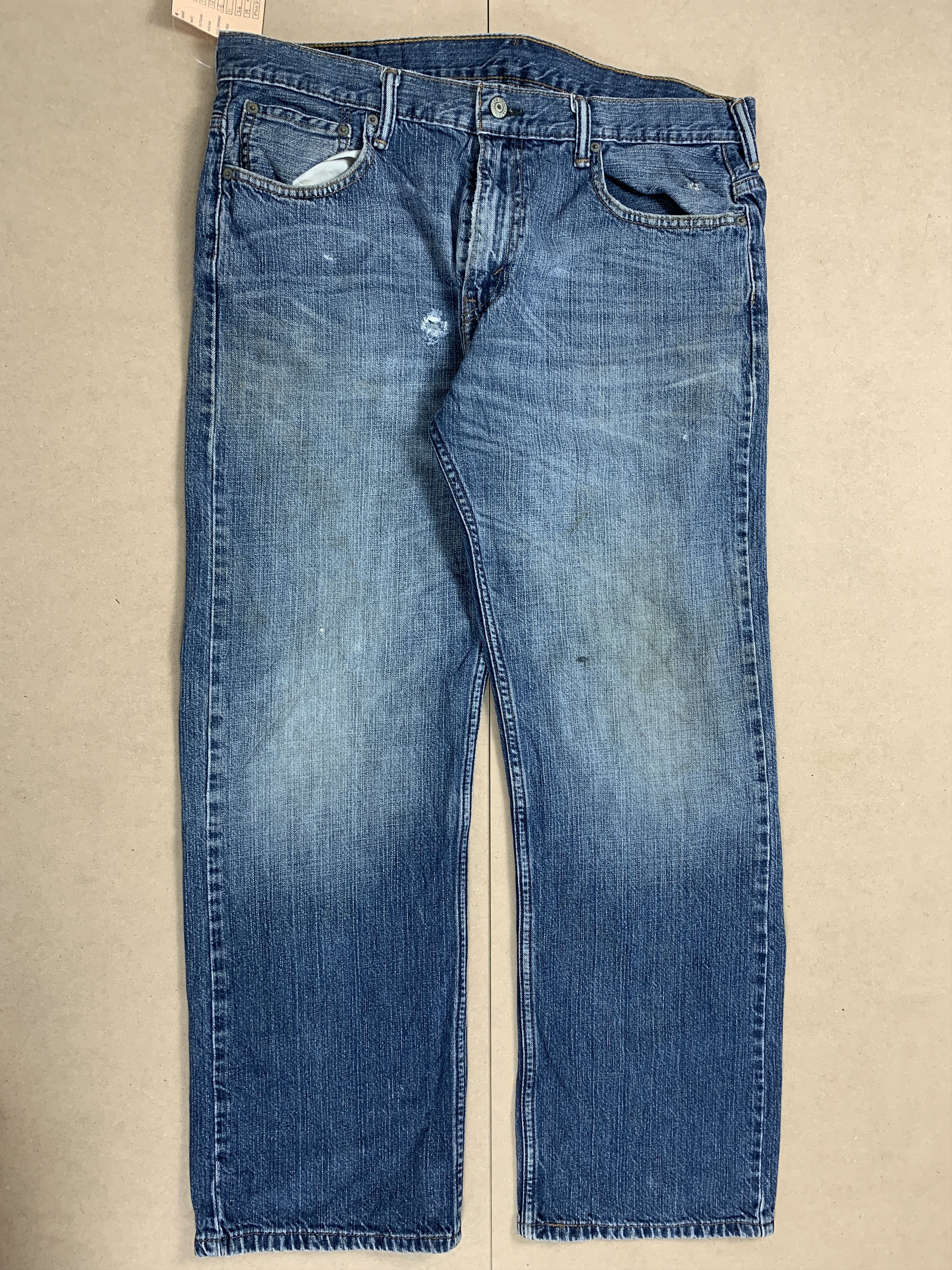 image of Levis x Vintage Levi's 569 Distressed Faded Mid Wash Jeans in Blue Denim, Men's (Size 34)