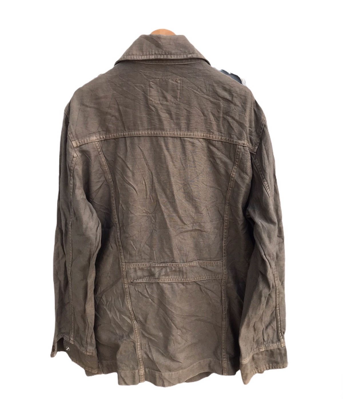 Sun faded Wrangler jacket