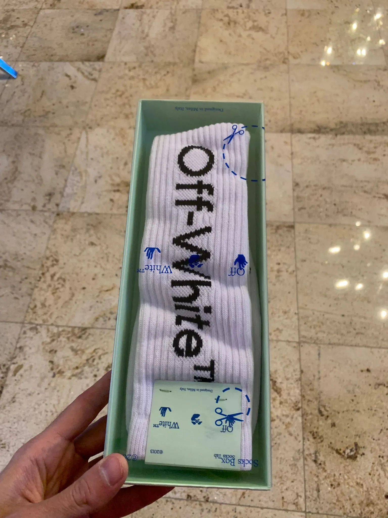image of Off White Logo Ribbed Socks In White, Men's
