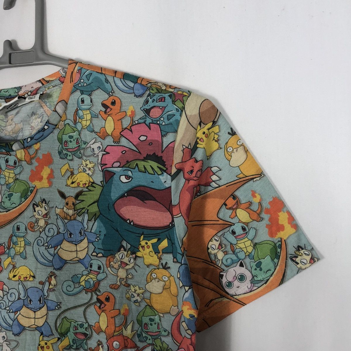 Nintendo 2017 Pokemon All Character AOP Polyster Tee Size US L / EU 52-54 / 3 - 5 Thumbnail