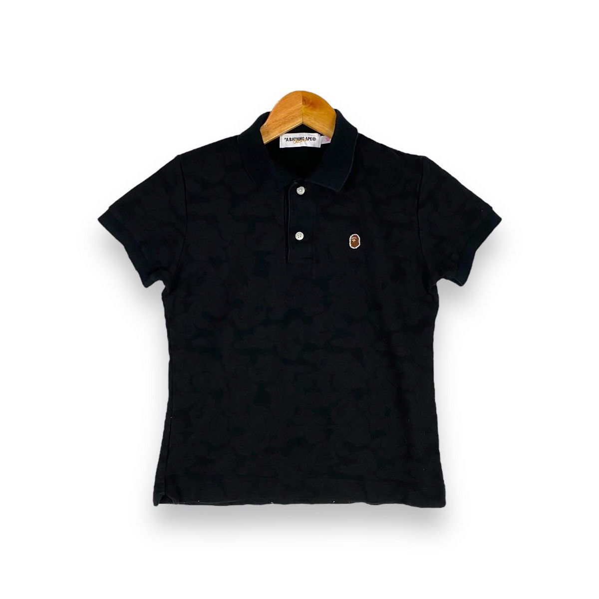 image of Bape x Nigo Solid Camo One Point Polo in Black, Women's (Size XS)