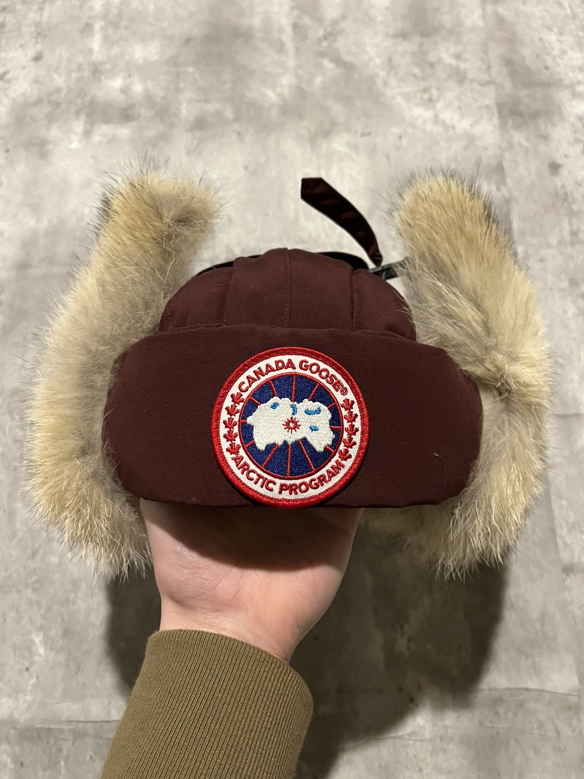 image of Canada Goose Aviator Fur Winter Hat in Burgundy, Men's