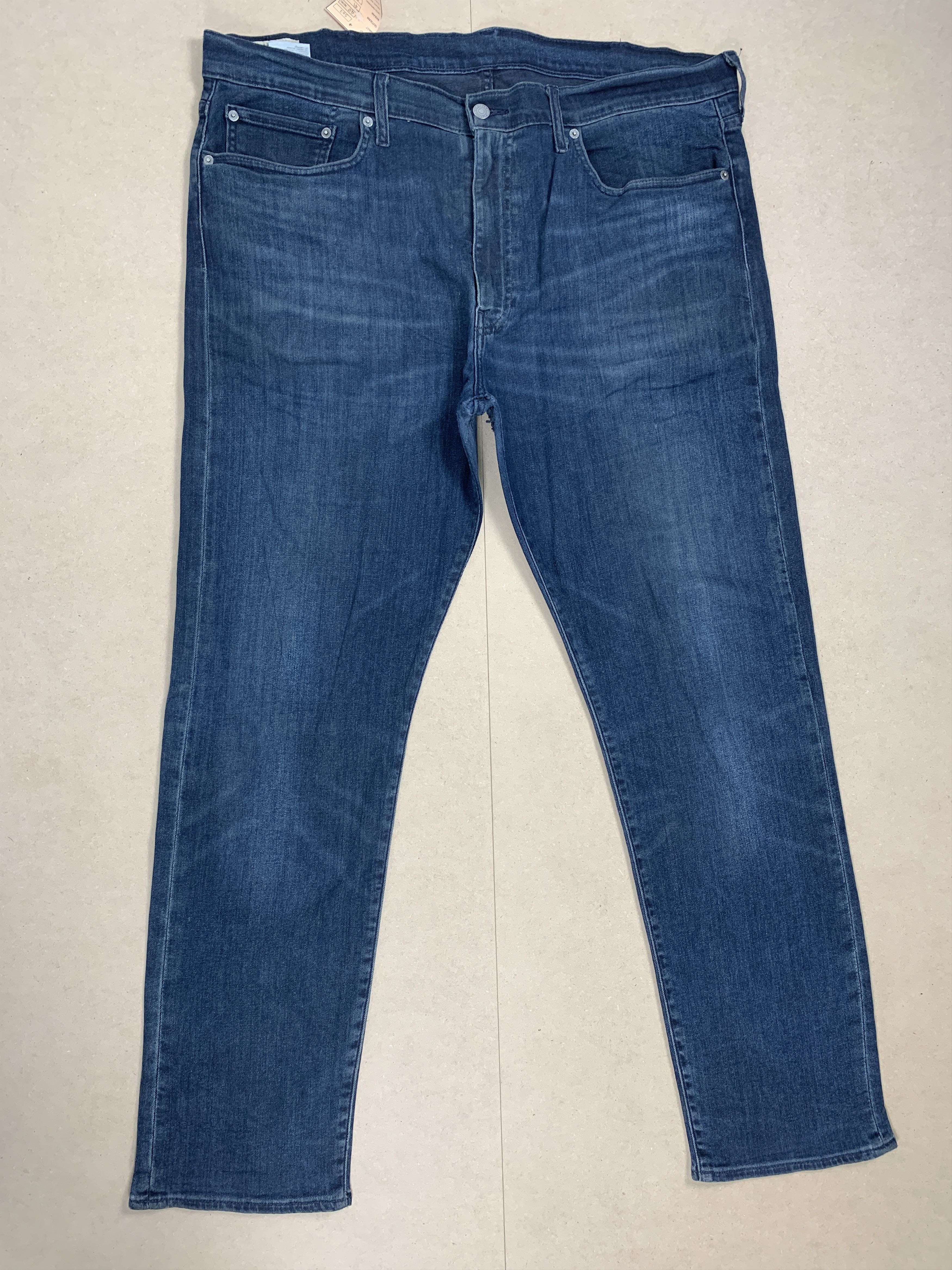 image of Levis 502 Mid Skinny Distressed Blue Jeans in Blue Denim, Men's (Size 40)
