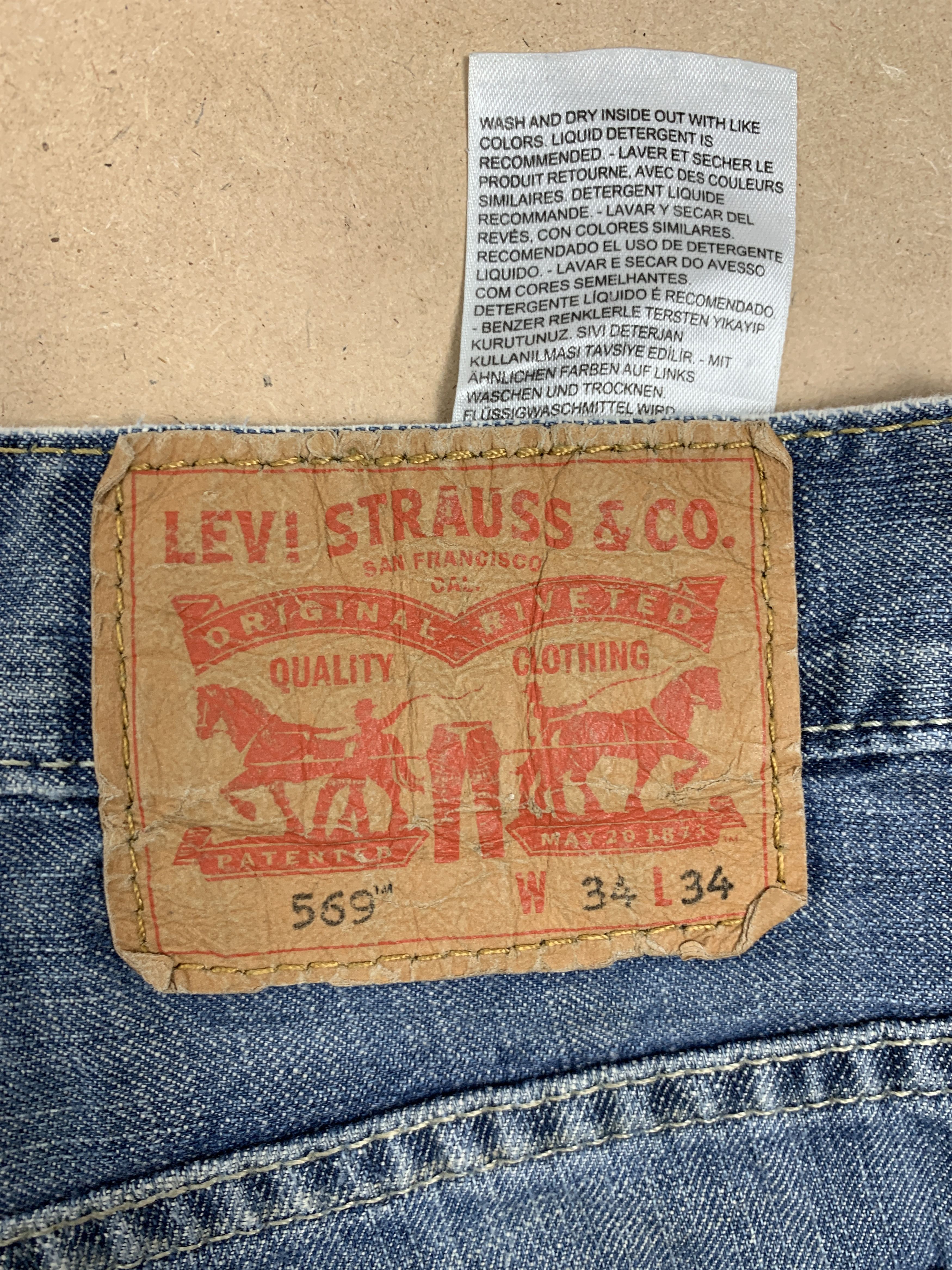 Levi's Vintage LEVI'S 569 Straight Cut Faded Mid Wash Distressed Size US 35 - 11 Thumbnail