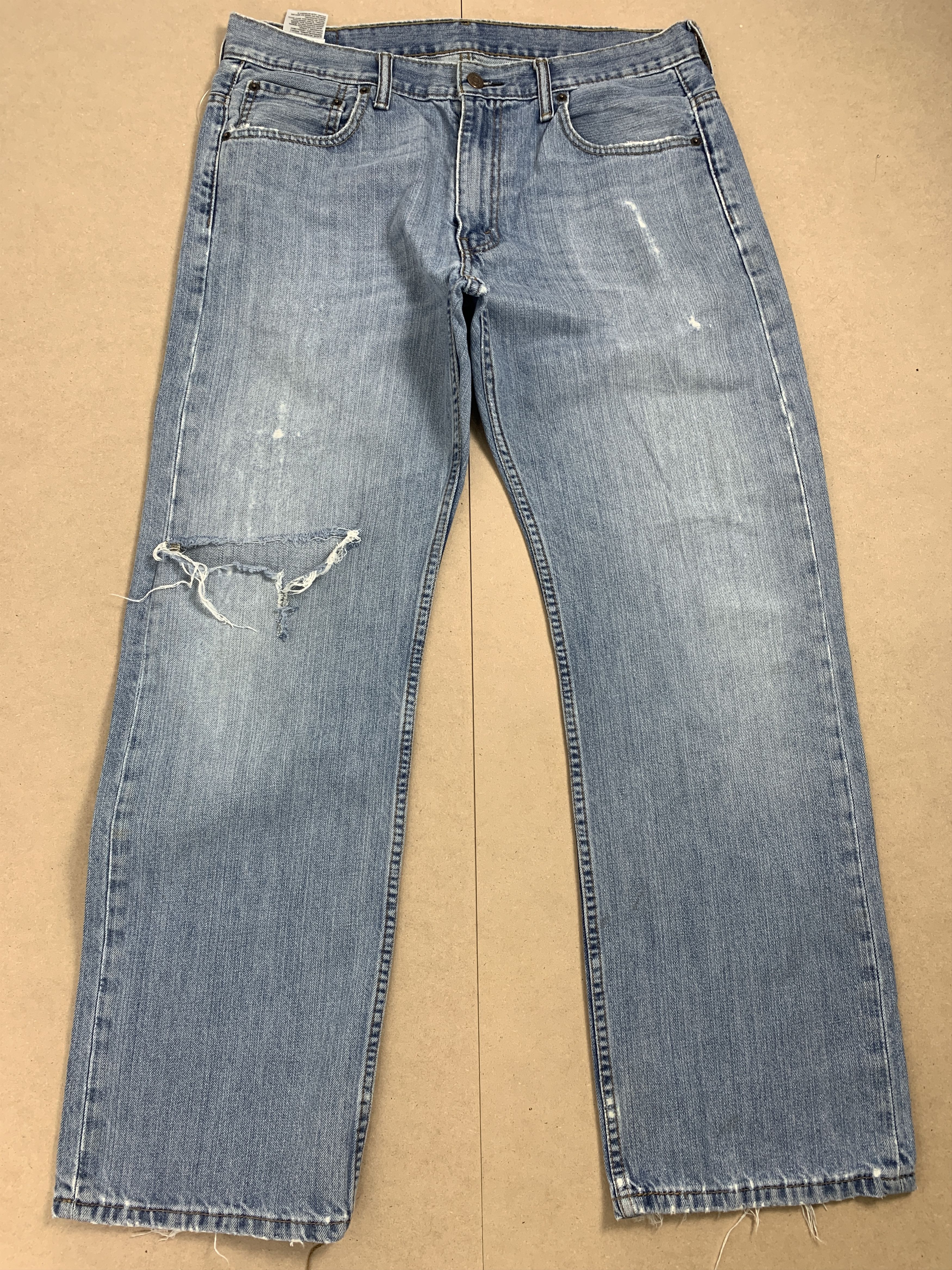 image of Levis x Vintage Levi's 569 Straight Cut Light Blue Distressed Jeans in Blue Denim, Men's (Size 35)